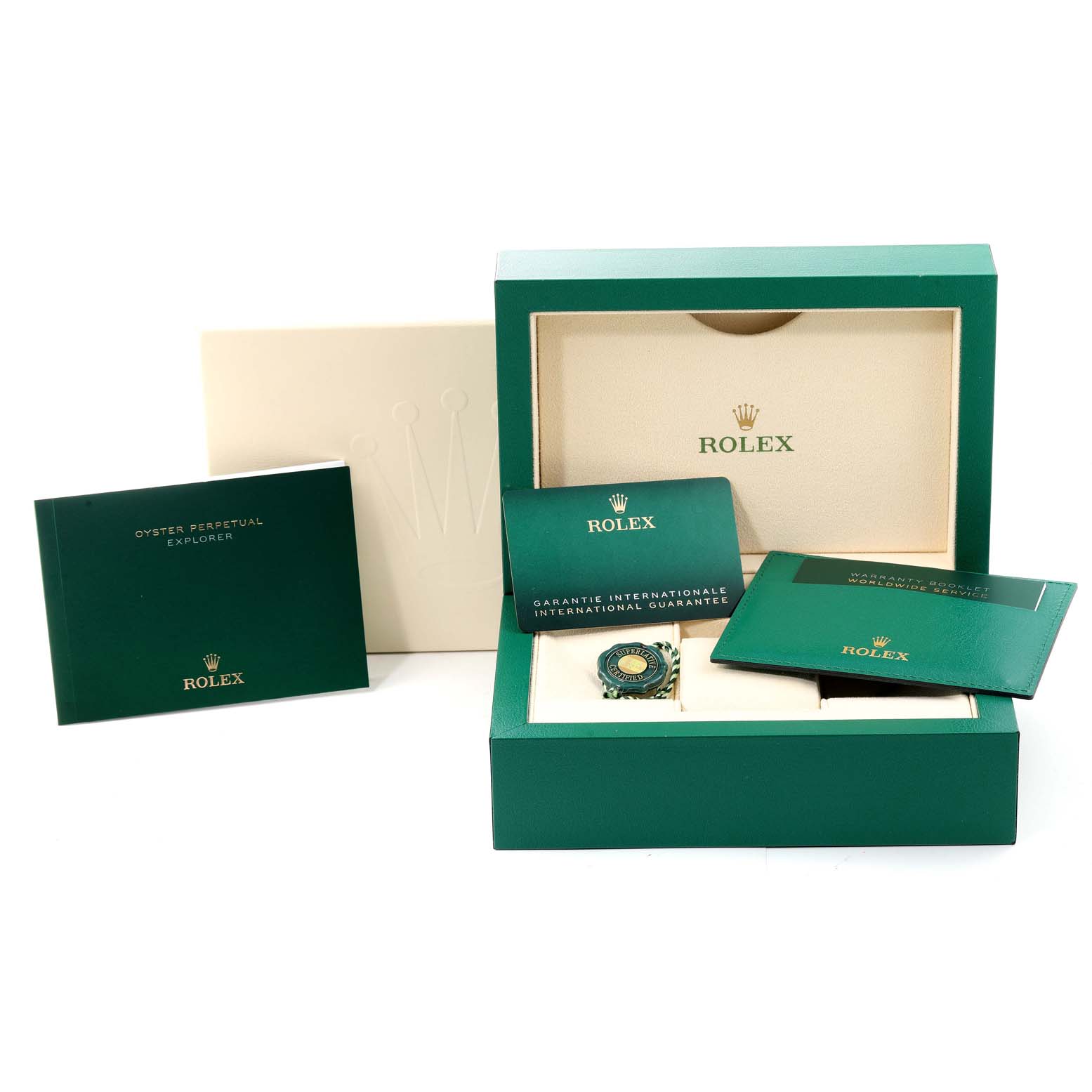 The image shows a Rolex Explorer 124270 Men's Stainless Steel Black Dial 124270 Men's Stainless Steel Black Dial watch box and accessories, including warranty cards and a manual, viewed from the front.