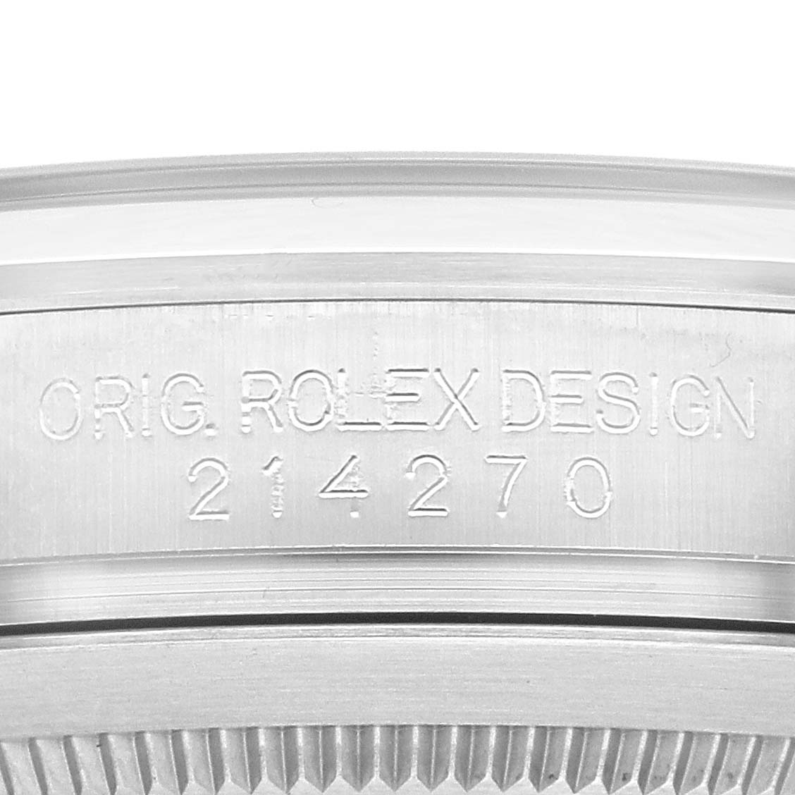 This image shows the engraved serial number and the words "ORIG. ROLEX DESIGN" on the edge of the Rolex Explorer 214270 Men
s Stainless Steel Black Dial 214270 Men
s Stainless Steel Black Dial watch case.