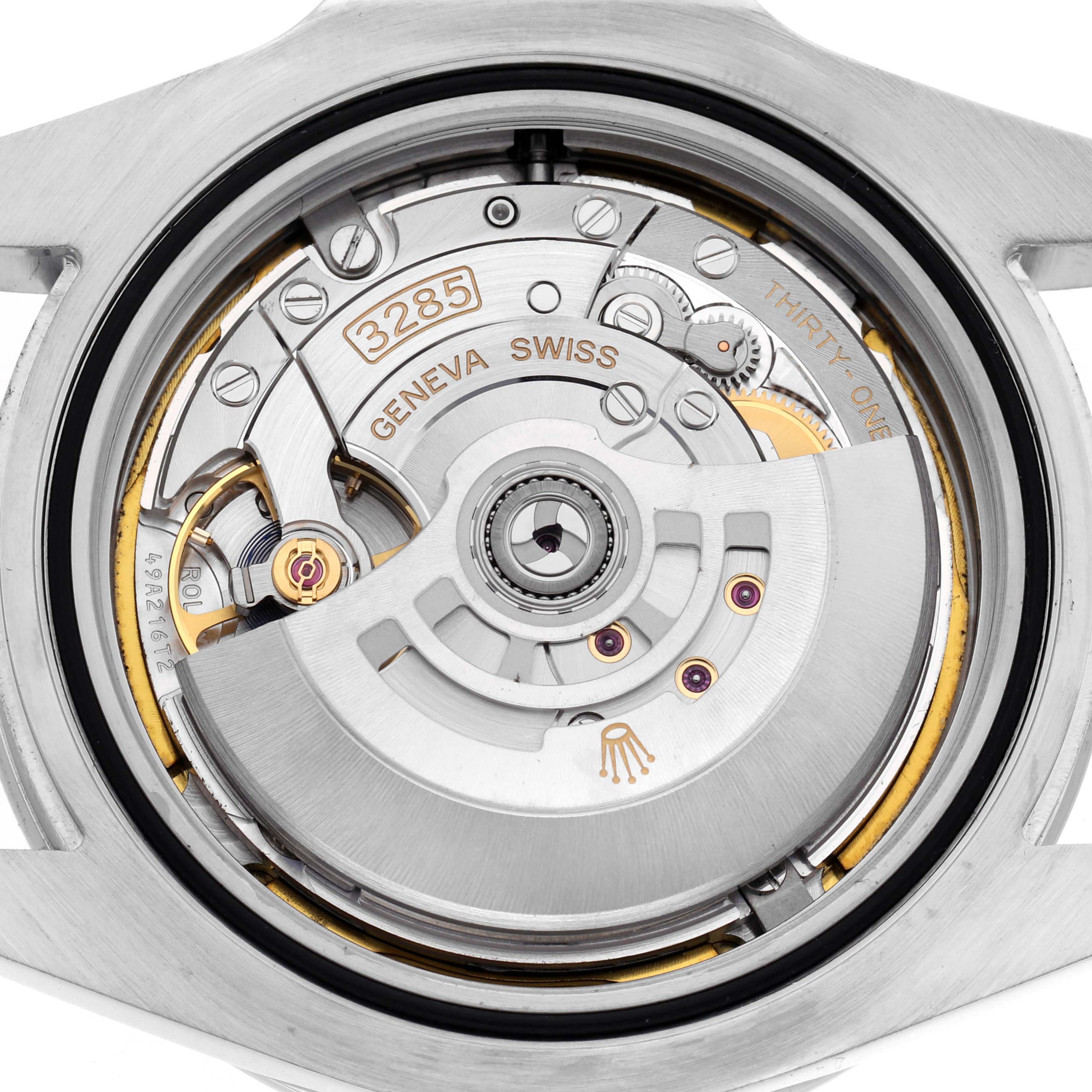 The image shows the movement and rotor of a Rolex Explorer 226570 Men
s Stainless Steel White Dial 226570 Men
s Stainless Steel White Dial watch, focusing on the internal mechanism from the back.