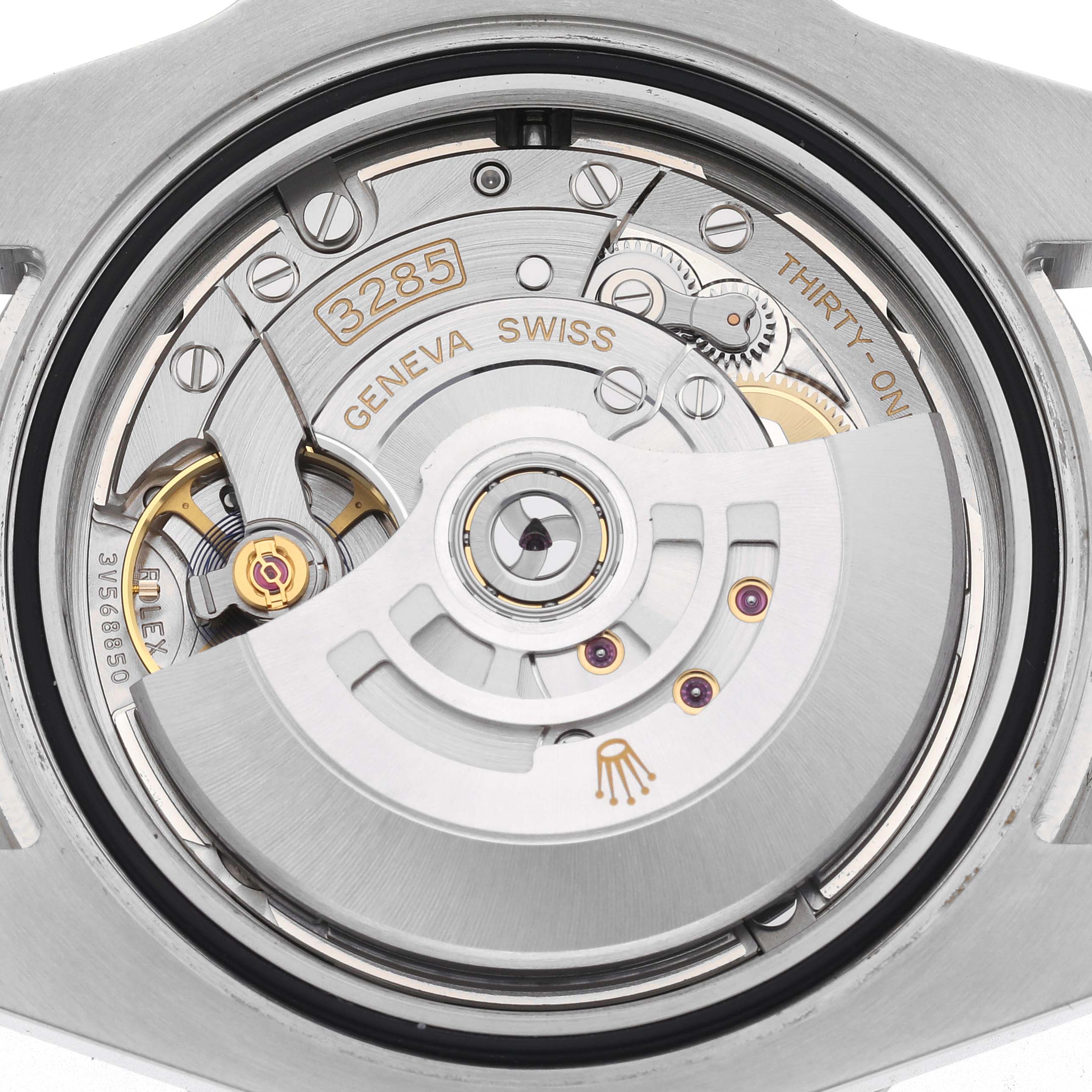 The image shows the back view of a Rolex GMT-Master 126710BLRO Men
s Stainless Steel Black Dial 126710BLRO Men
s Stainless Steel Black Dial, highlighting its intricate movement and rotor.