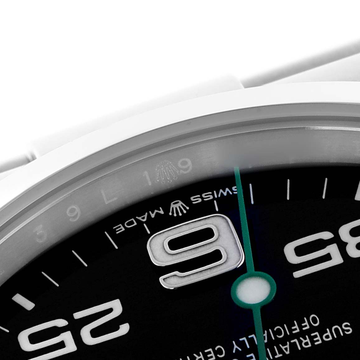 The image shows a close-up of the Rolex Air-King 126900 Men's Stainless Steel Black Dial 126900 Men's Stainless Steel Black Dial watch, highlighting part of the dial and the numerals.