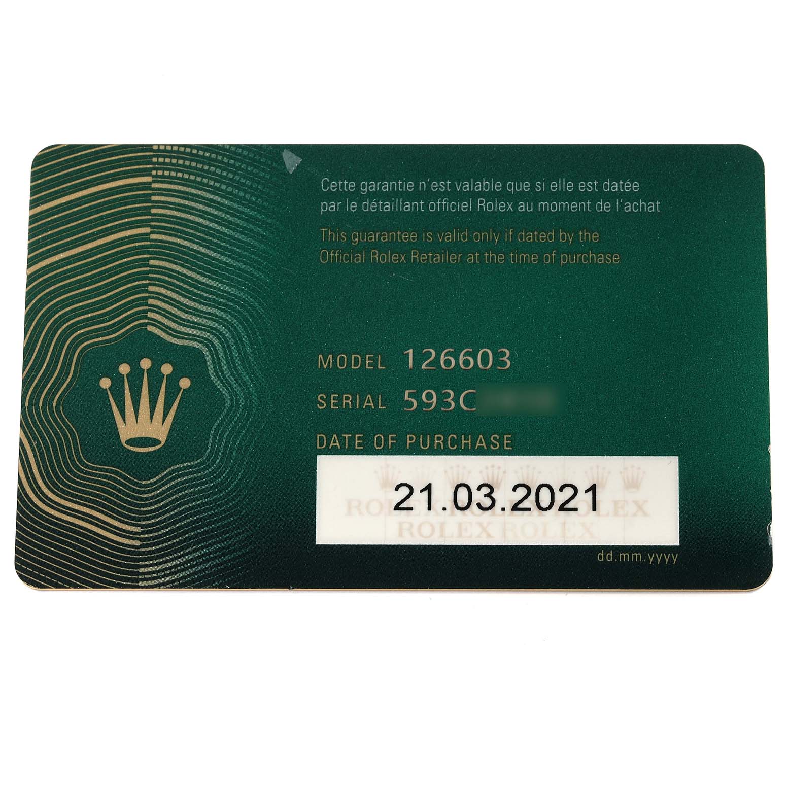 This image shows the guarantee card for a Rolex Sea-Dweller 126603 Men
s Steel and Gold (two tone) Black Dial 126603 Men
s Steel and Gold (two tone) Black Dial model 126603 purchased on 21.03.2021.