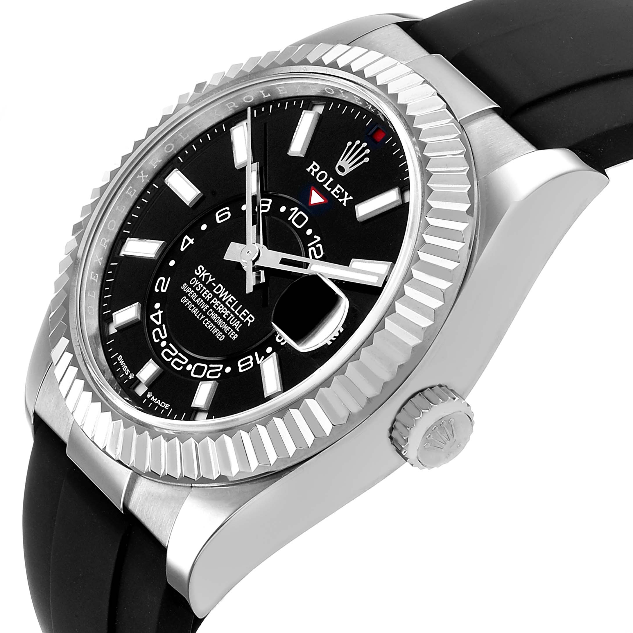 The Rolex Sky-Dweller 336239 Men's White Gold Black Dial watch is shown at a slight angle, highlighting the black dial, fluted bezel, and crown, with a black strap.