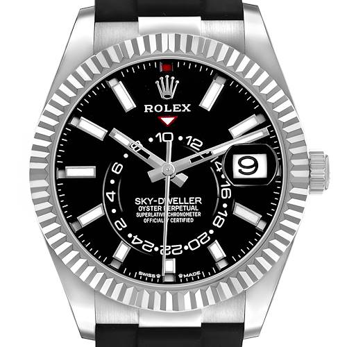 The Rolex Sky-Dweller 336239 Men's White Gold Black Dial watch is shown from a front view featuring its black dial, fluted bezel, and part of its black strap.