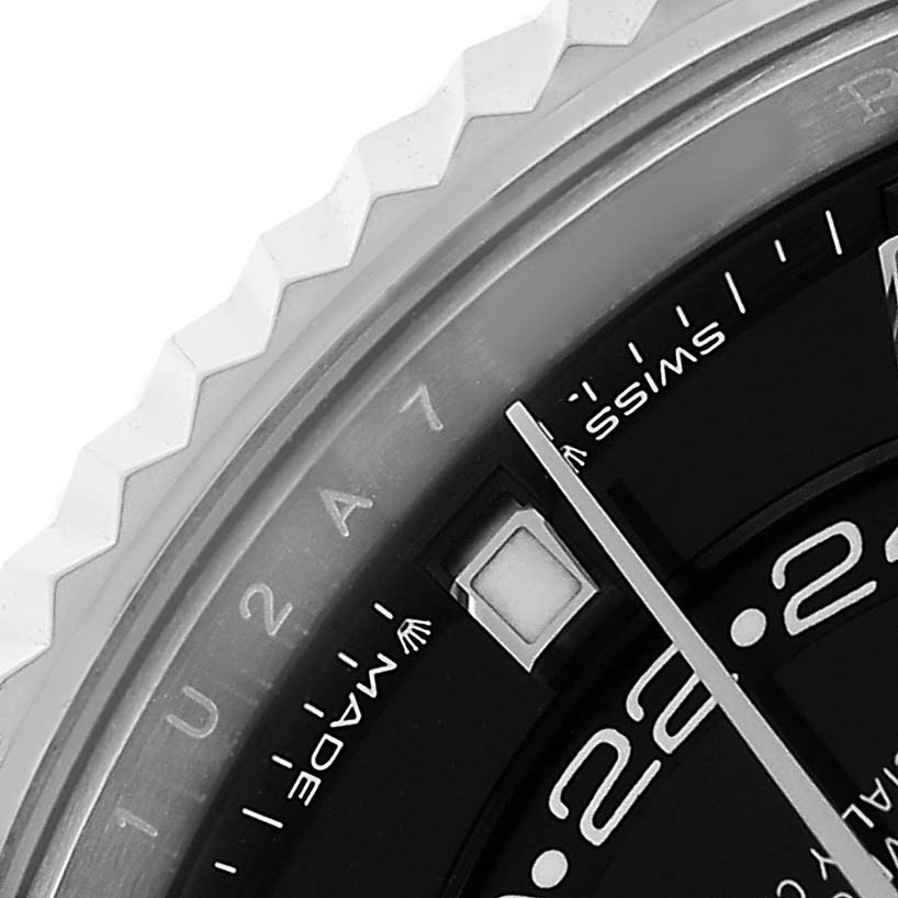 The image shows a close-up view of the Rolex Sky-Dweller 336239 Men's White Gold Black Dial watch, highlighting the bezel, part of the dial, and indices.