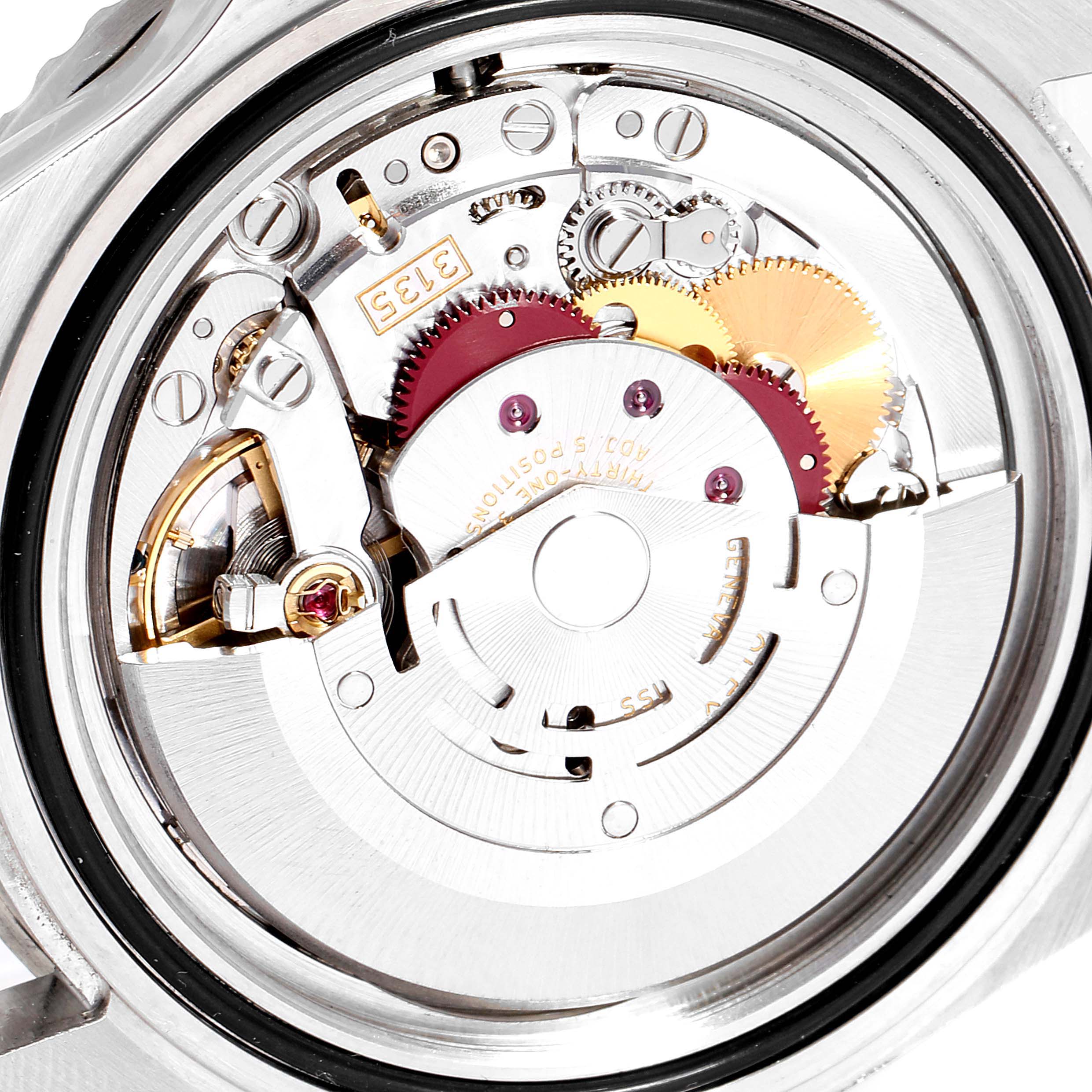 The image shows a close-up of the Rolex Submariner 16610LV Men's Stainless Steel Black Dial 16610LV Men's Stainless Steel Black Dial's movement mechanism from the back.