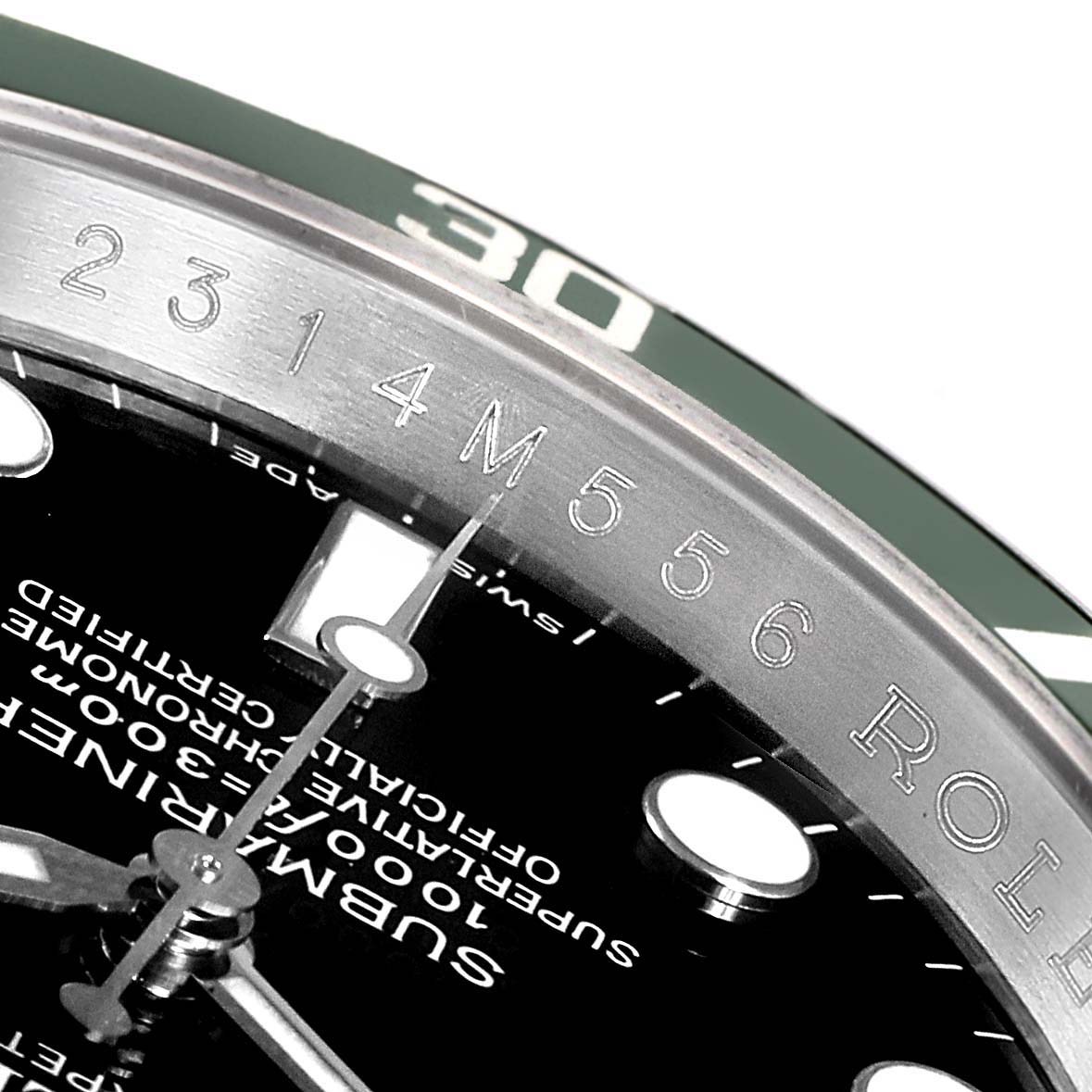 This close-up shot shows the dial, bezel, and engraving of the Rolex Submariner 16610LV Men's Stainless Steel Black Dial 16610LV Men's Stainless Steel Black Dial watch.