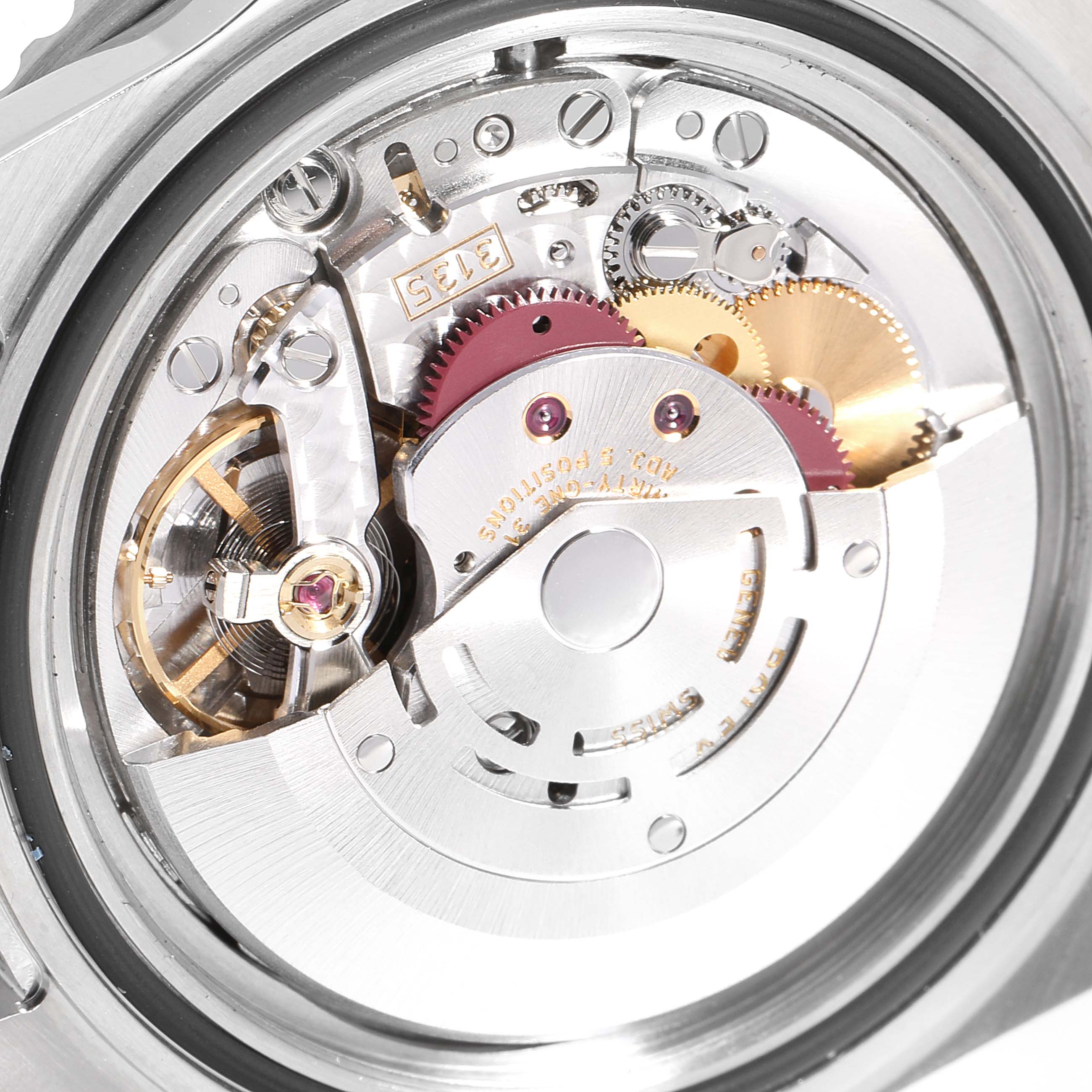 This image shows a close-up view of the internal mechanical movement of a Rolex Submariner 16610LV Men's Stainless Steel Black Dial 16610LV Men's Stainless Steel Black Dial watch.