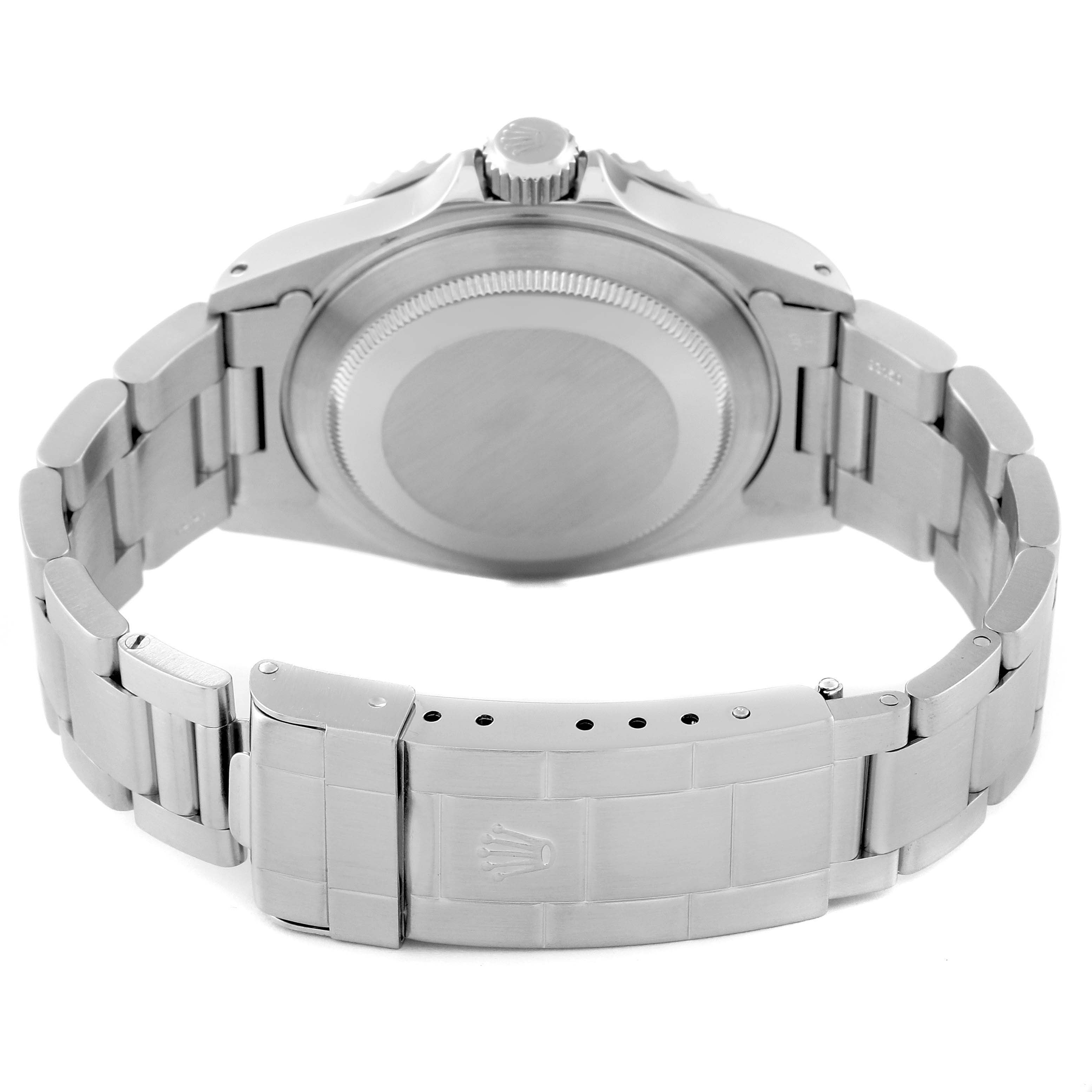 This image shows the backside of the Rolex Submariner 14060M Men
s Stainless Steel Black Dial 14060M Men
s Stainless Steel Black Dial watch, highlighting the case back, crown, and bracelet with the clasp.