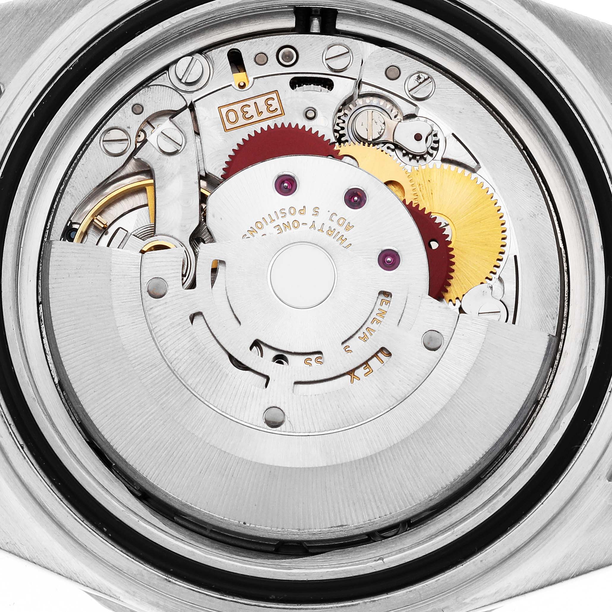 The image shows the internal mechanism and movement of the Rolex Submariner 14060M Men
s Stainless Steel Black Dial 14060M Men
s Stainless Steel Black Dial model watch from the back angle.