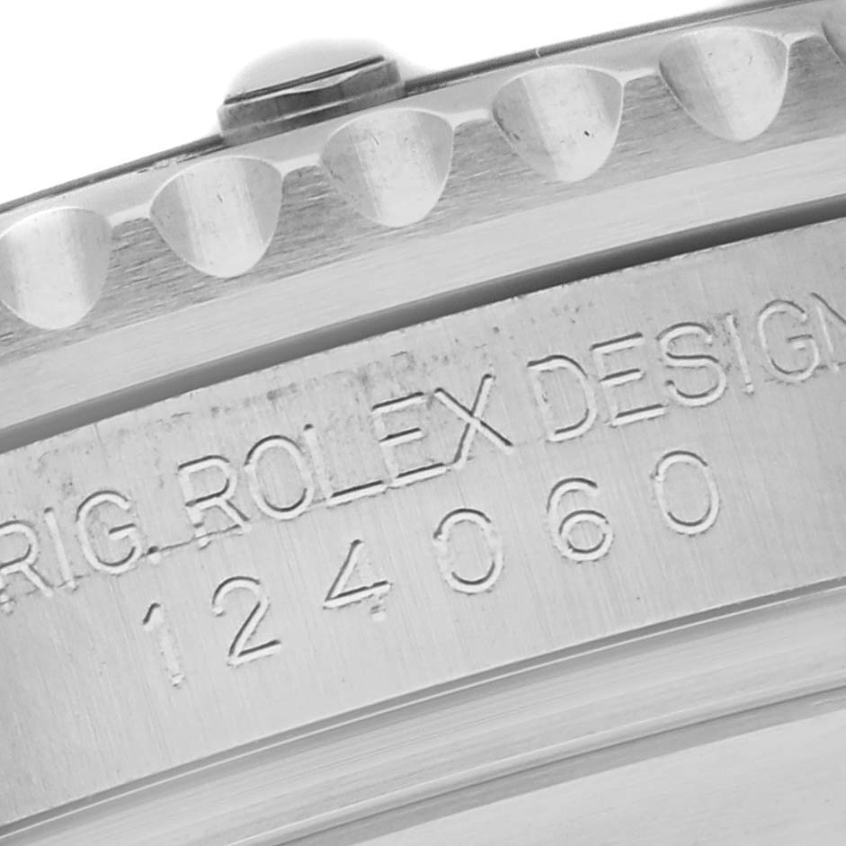 This close-up angle displays the engraved caseback and bezel of the Rolex Submariner M124060-0001 Men
s Stainless Steel Black Dial M124060-0001 Men
s Stainless Steel Black Dial 124060.