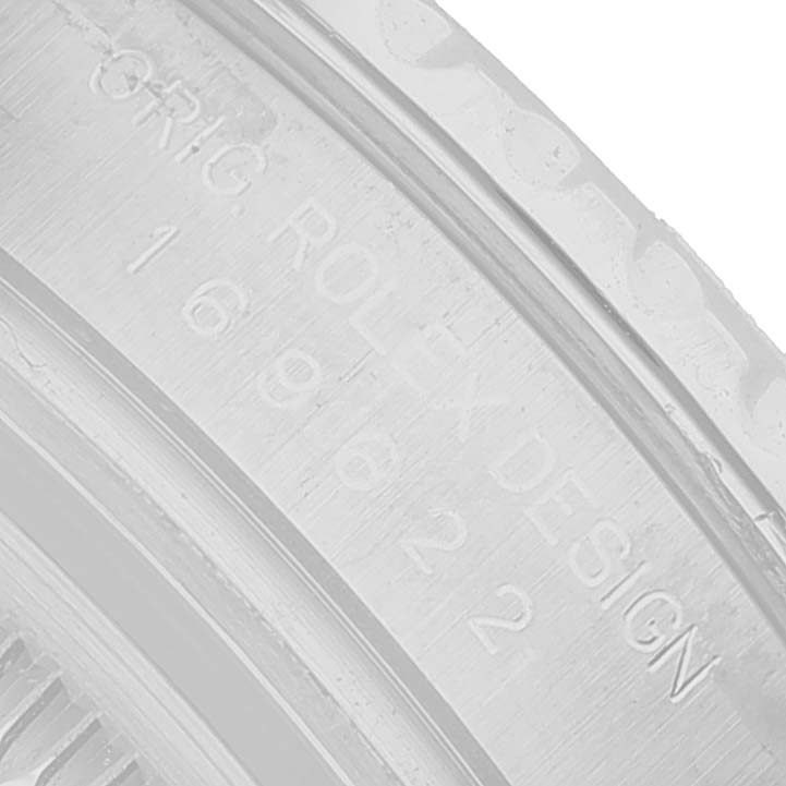 The image shows a close-up of the engraving on the caseback edge of a Rolex Yacht-Master 169622 Women's Stainless Steel Silver Dial watch.