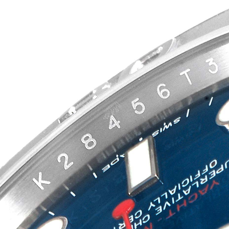 The image shows a close-up angle of the bezel and part of the dial of the Rolex Yacht-Master 116622 Men
s Stainless Steel Blue Dial 116622 Men
s Stainless Steel Blue Dial watch.
