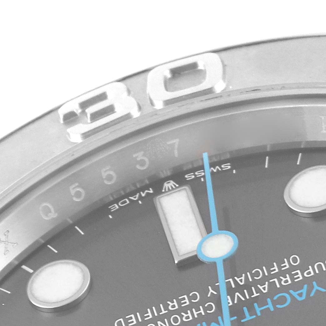 This close-up image of a Rolex Yacht-Master 126622 Men
s Stainless Steel Grey Dial 126622 Men
s Stainless Steel Grey Dial watch shows the bezel, part of the dial, and the minute hand.
