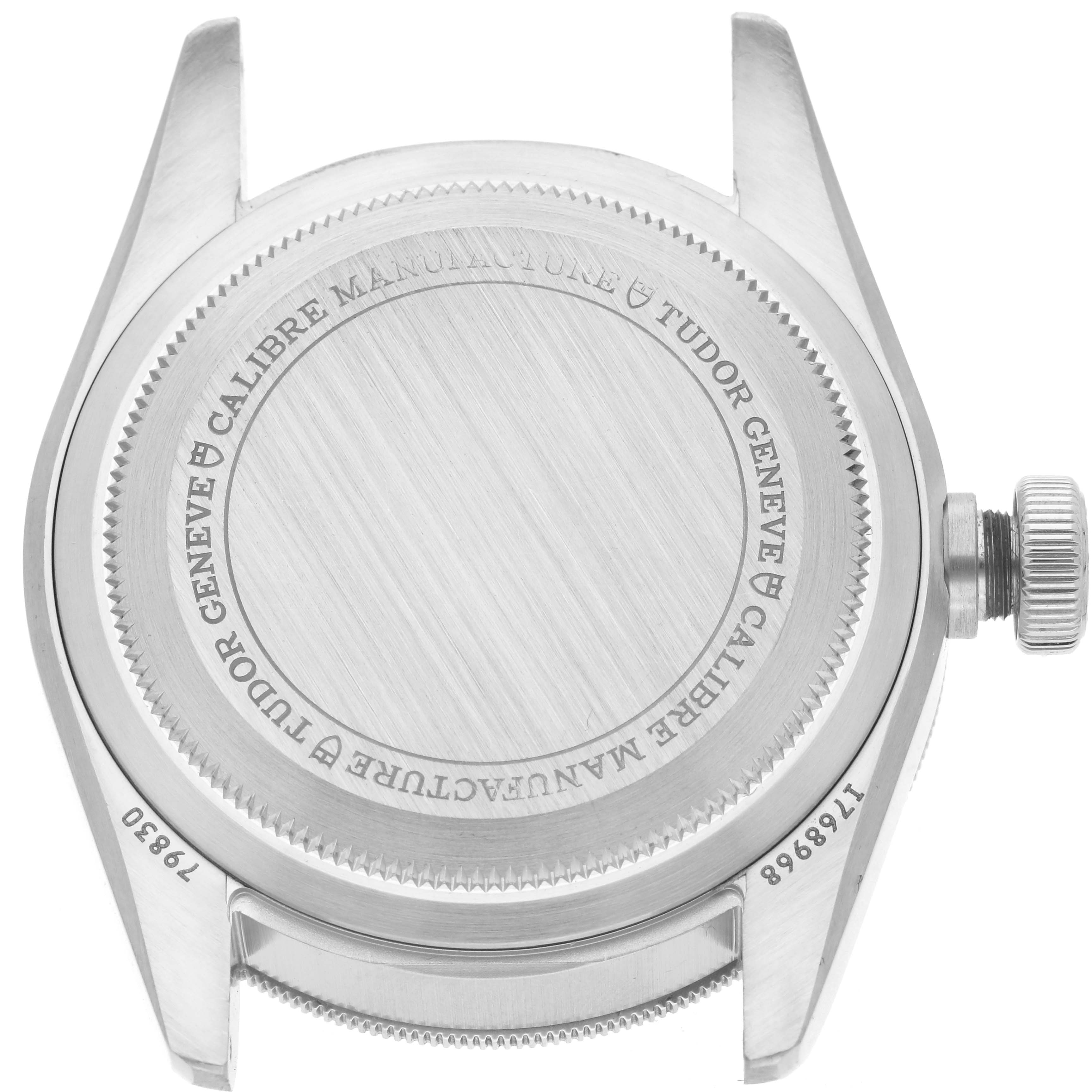 The image shows the back of the Tudor Heritage Black Bay 79830RB Men
s Stainless Steel Black Dial 79830RB Men
s Stainless Steel Black Dial watch case, including the case back and crown.