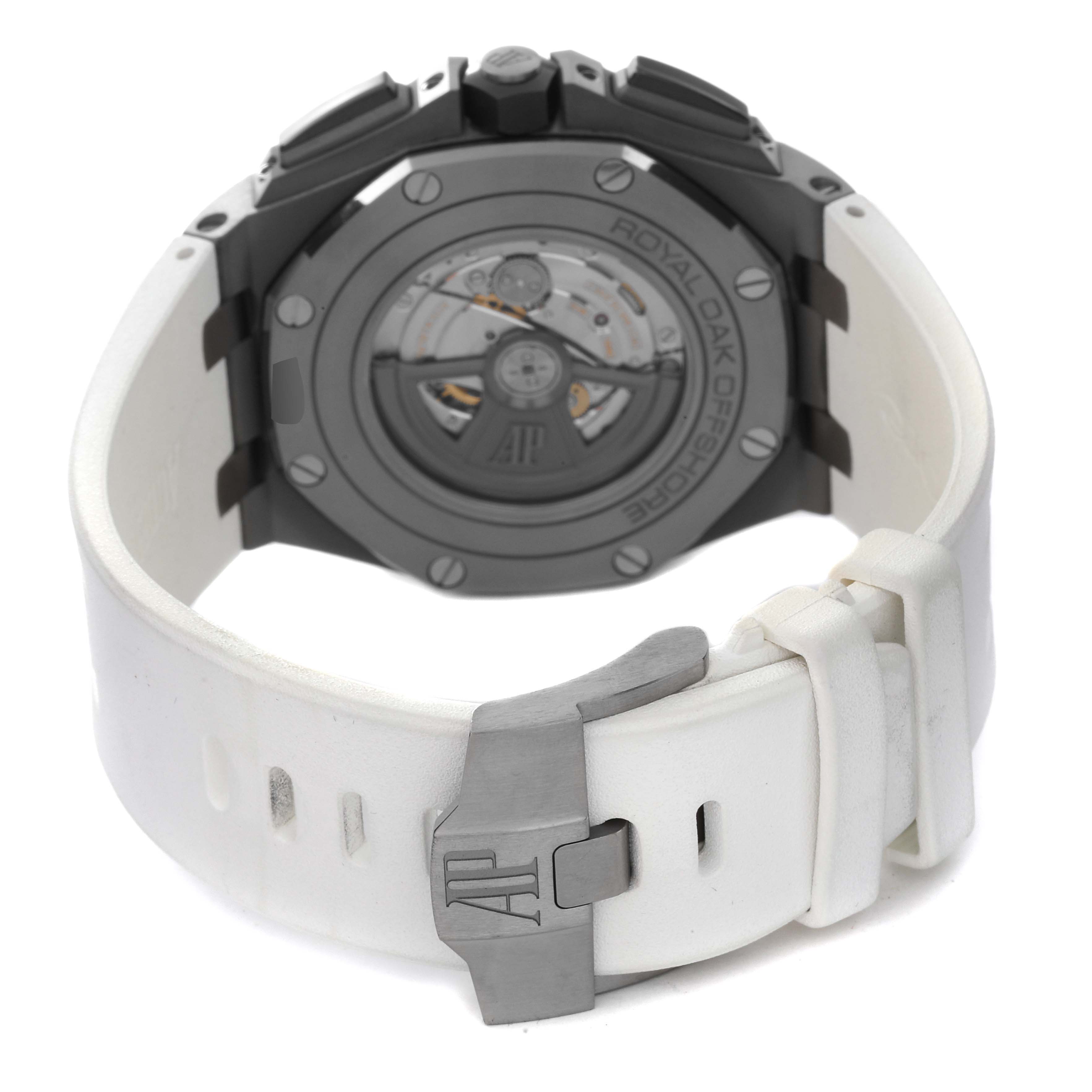 The image shows the back view and clasp of the Royal Oak Offshore model by Audemars Piguet, revealing the movement and white strap.