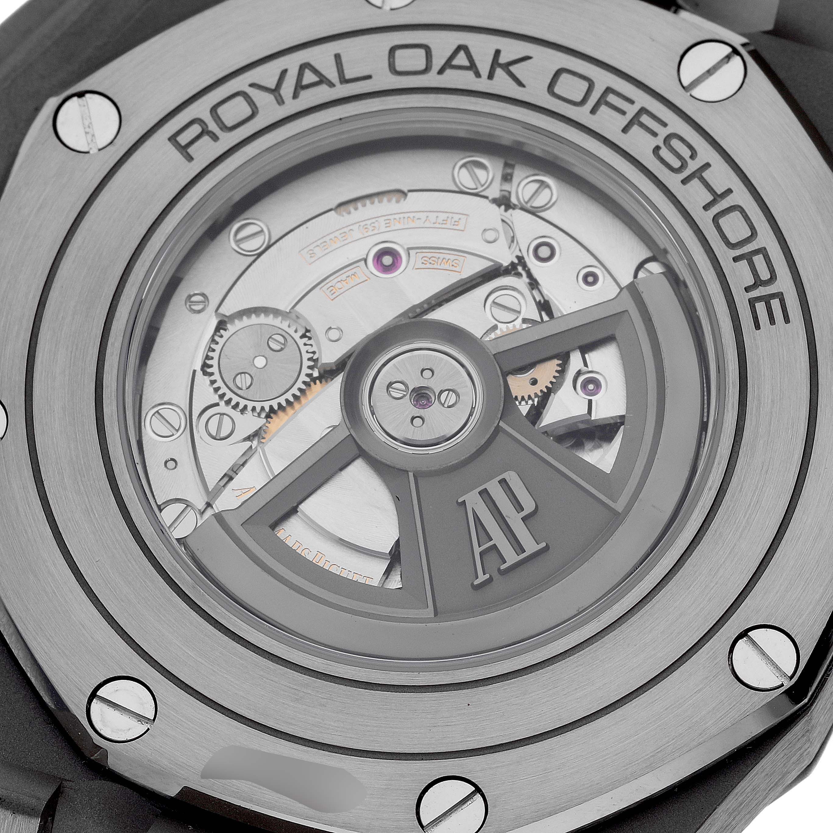 The image shows the back of the Audemars Piguet Royal Oak Offshore 26400IO.OO.A004CA.01 Men's Titanium Grey Dial 26400IO.OO.A004CA.01 Men's Titanium Grey Dial, focusing on its movement and rotor mechanism.