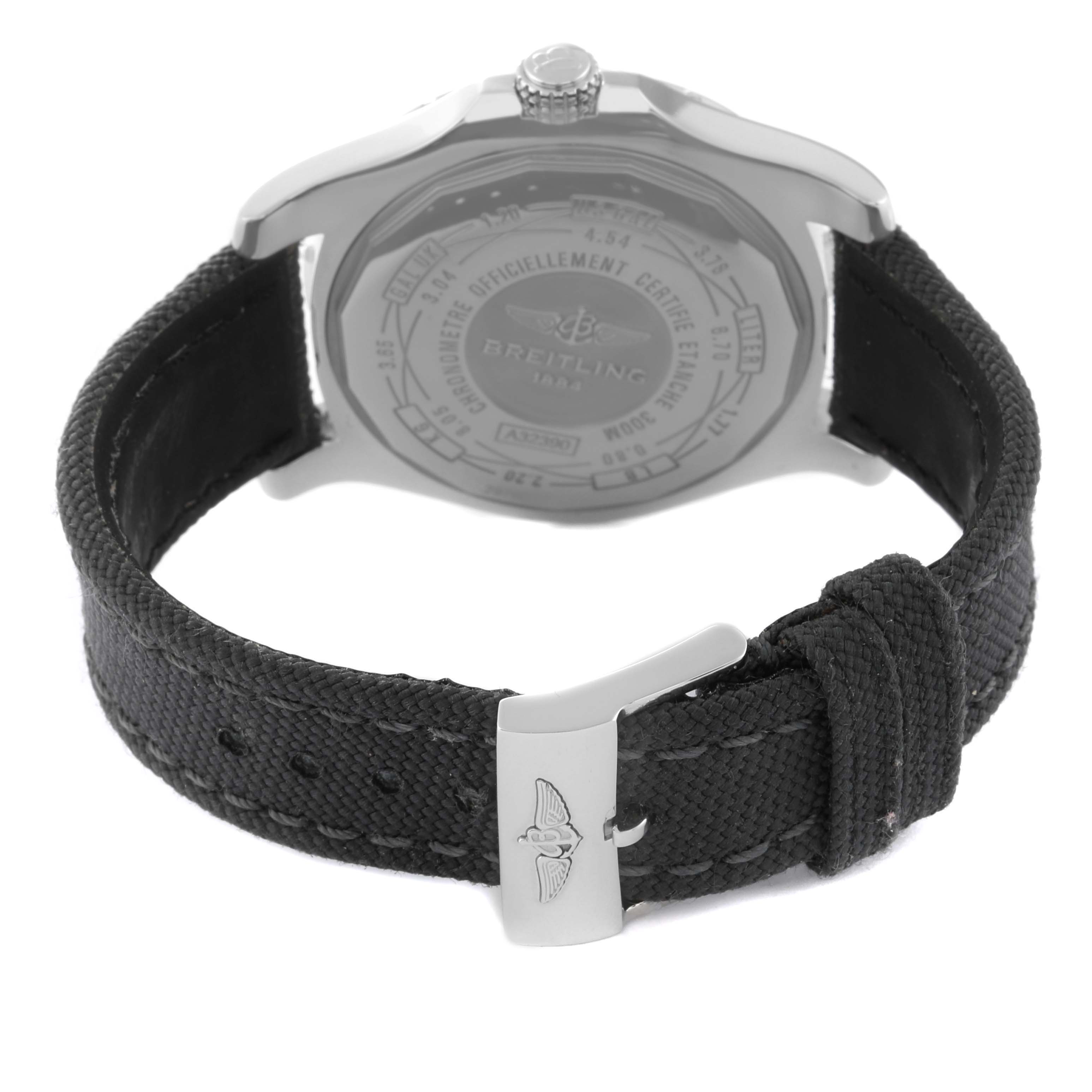 The image shows the back of a Breitling Avenger A3239011/A809 Men's Stainless Steel Mother of Pearl Dial A3239011/A809 Men's Stainless Steel Mother of Pearl Dial watch, focusing on the case back and black fabric strap with a metallic clasp.