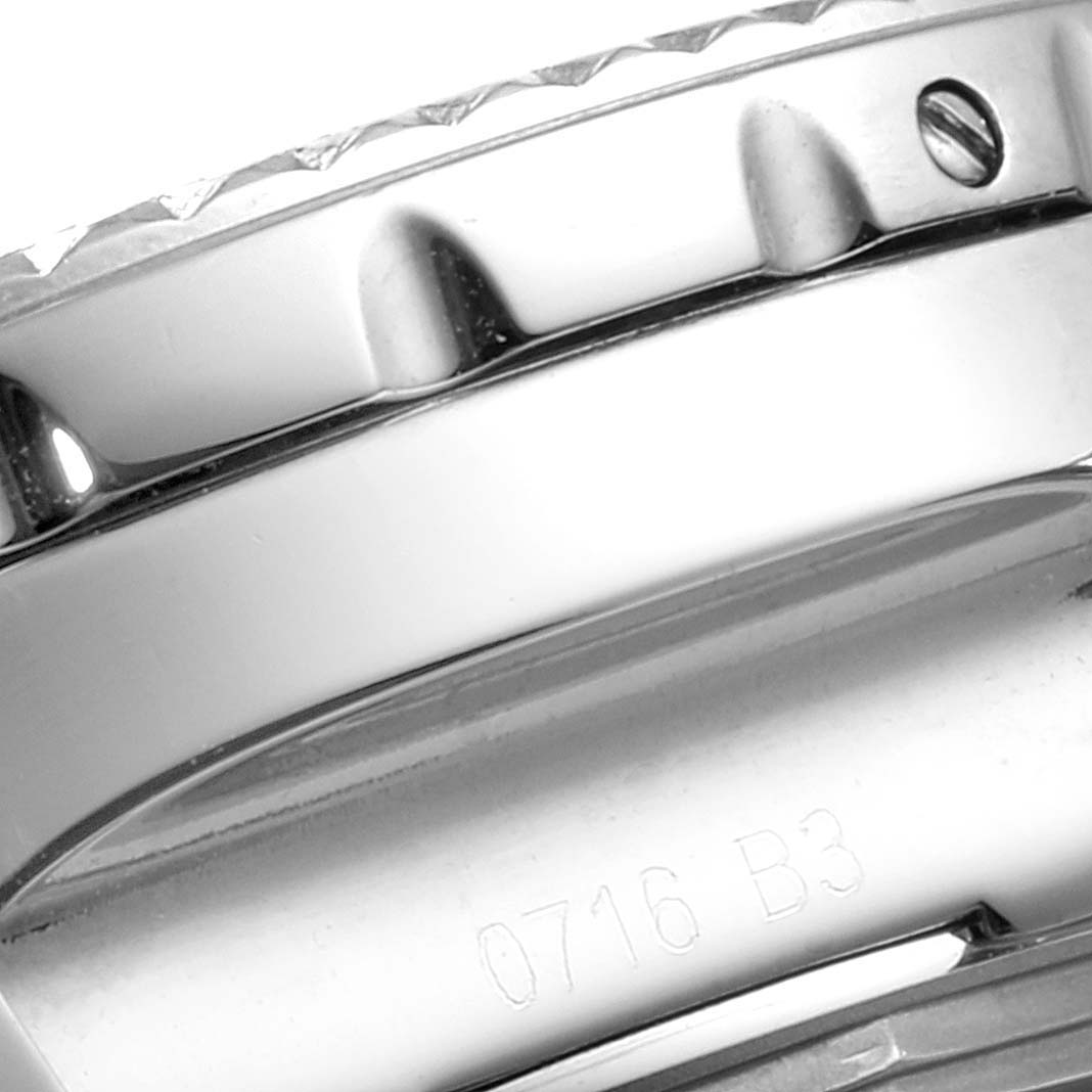 Close-up of the Breitling Bentley AB061221/BD93 Men's Stainless Steel Black Dial AB061221/BD93 Men's Stainless Steel Black Dial model showing its bezel and case with some engraved serial numbers.