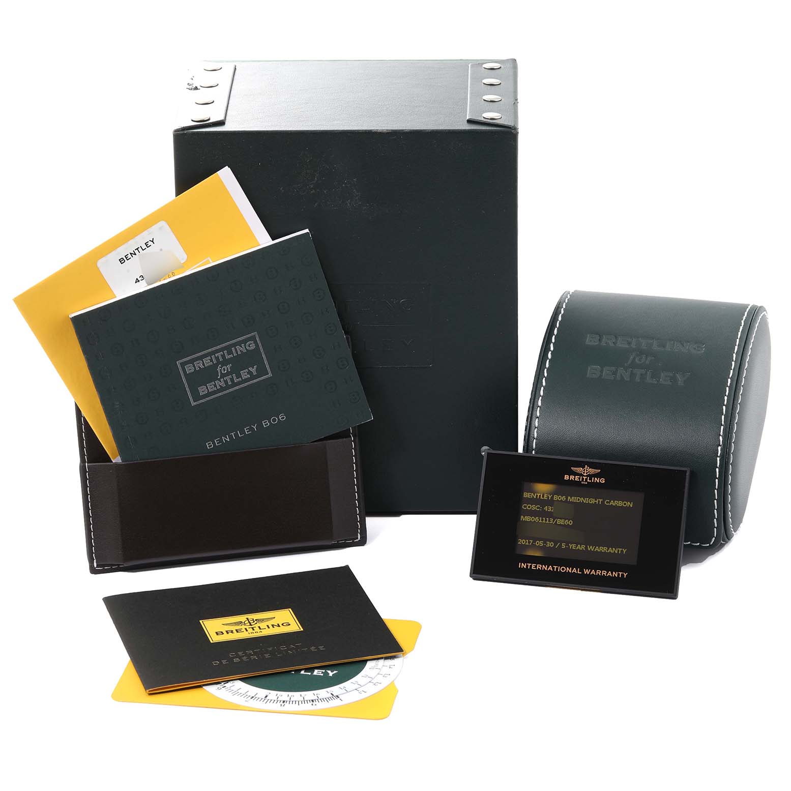 The image shows the packaging, manuals, warranty card, and carrying case for a Bentley model by Breitling.