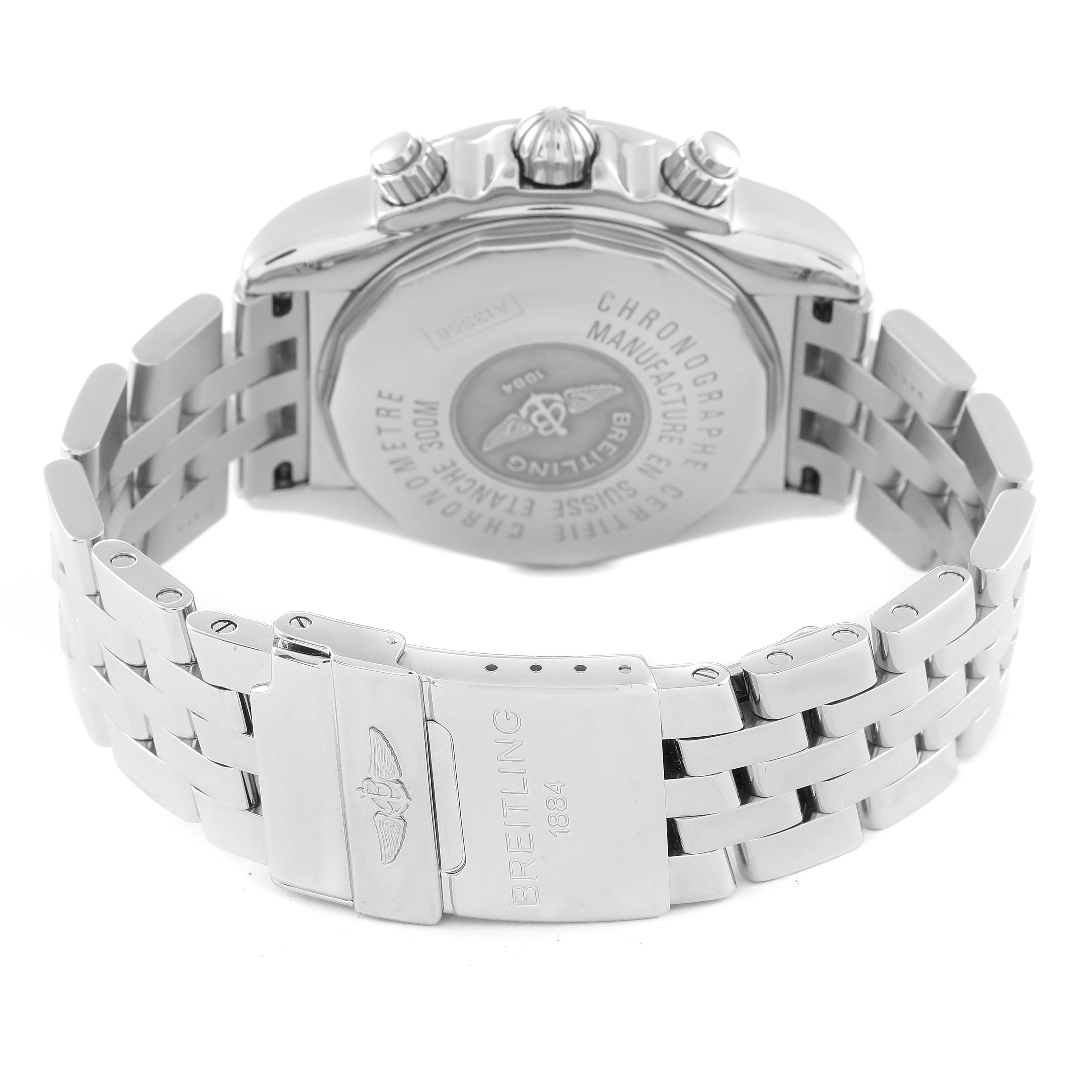 This image shows the back and clasp of a Breitling Chronomat A13356 Men
s Stainless Steel Blue Dial A13356 Men
s Stainless Steel Blue Dial watch, highlighting the engraved case back and metal bracelet.