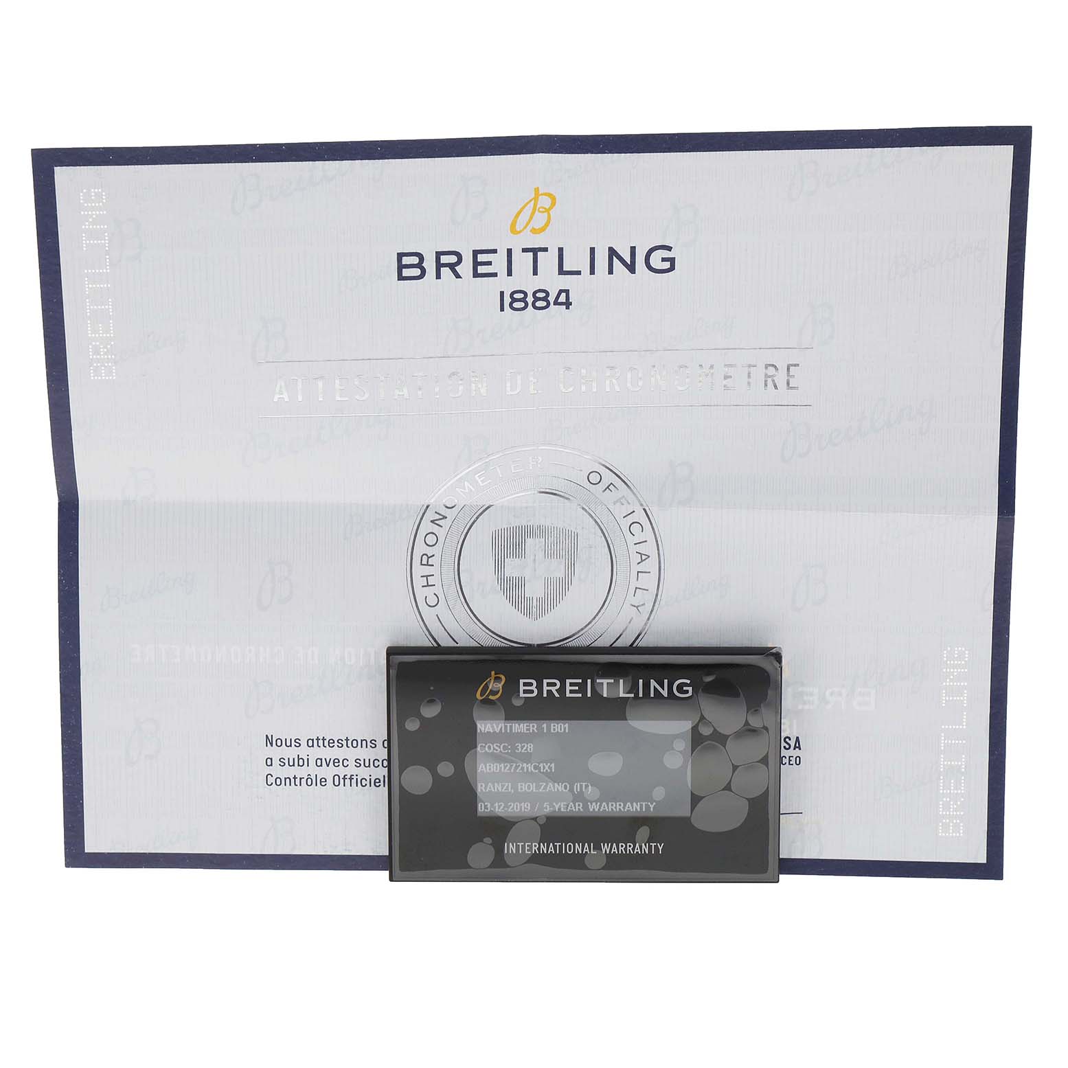 The image shows the Breitling Navitimer AB0127 Men
s Stainless Steel Blue Dial AB0127 Men
s Stainless Steel Blue Dial warranty card and certificate from a frontal view.