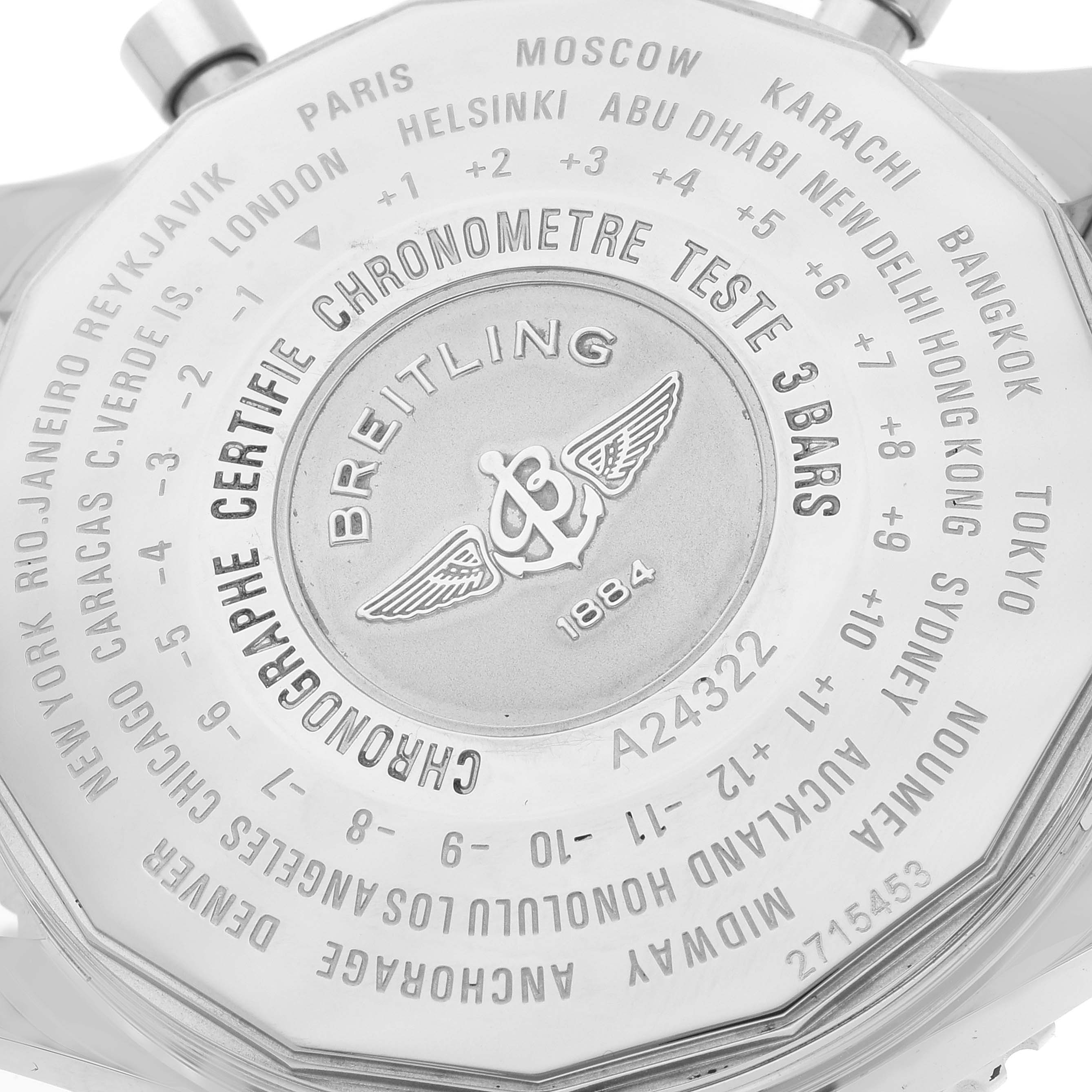 The image shows the back case of a Breitling Navitimer A24322 Men's Stainless Steel Black Dial A24322 Men's Stainless Steel Black Dial watch, displaying various city names and time zone information.