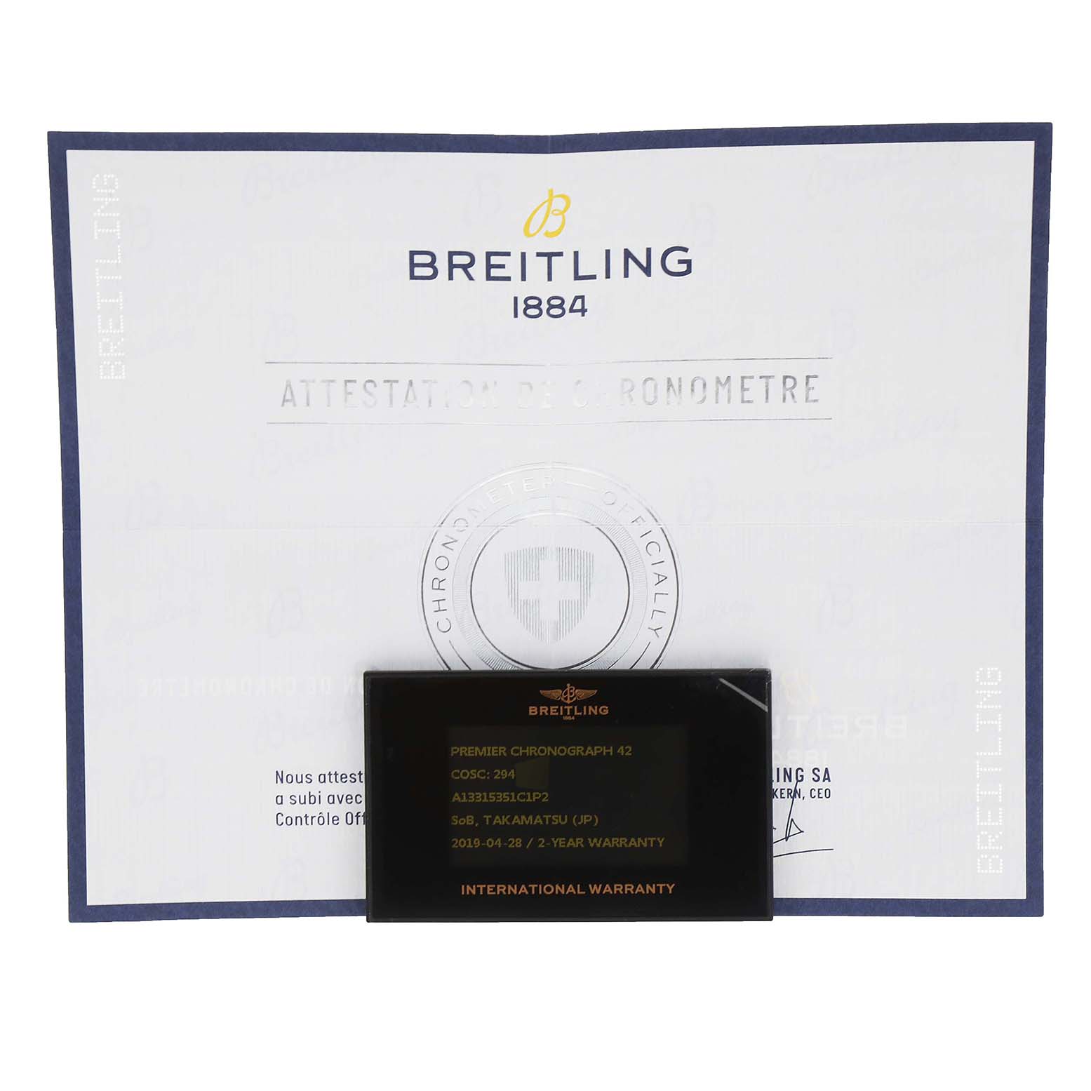 The image shows the warranty card and certificate for a Breitling Premier A13315 Men's Stainless Steel Blue Dial A13315 Men's Stainless Steel Blue Dial Chronograph 42 watch.