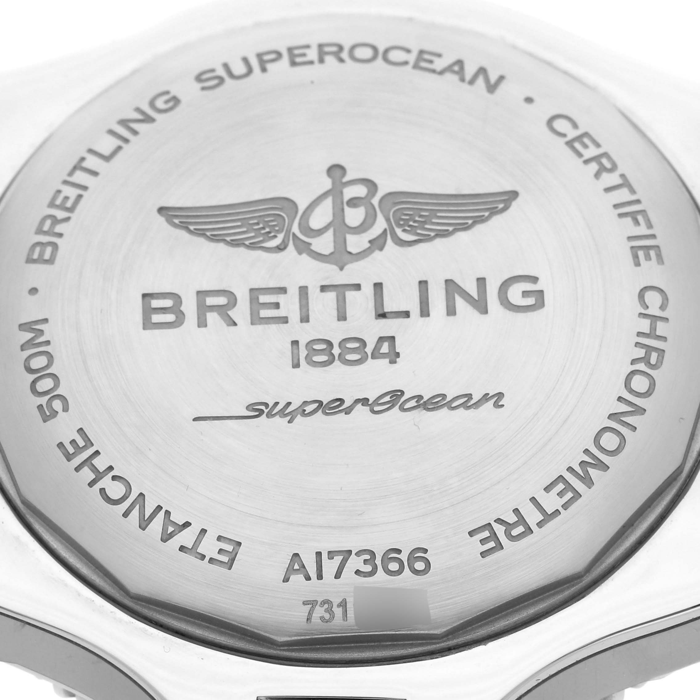The image shows a close-up of the case back of a Breitling Superocean A17366D71B2S1 Men's Stainless Steel Black Dial A17366D71B2S1 Men's Stainless Steel Black Dial watch, displaying engravings and information.