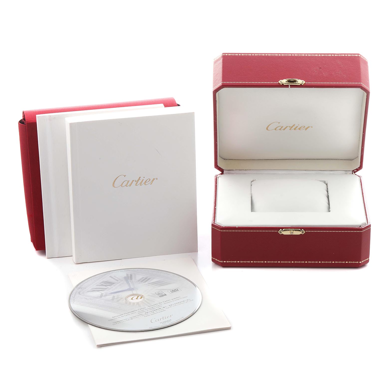 The image shows the packaging of the Ballon Bleu de Cartier, including a red box, manual, and a CD from an overhead angle.