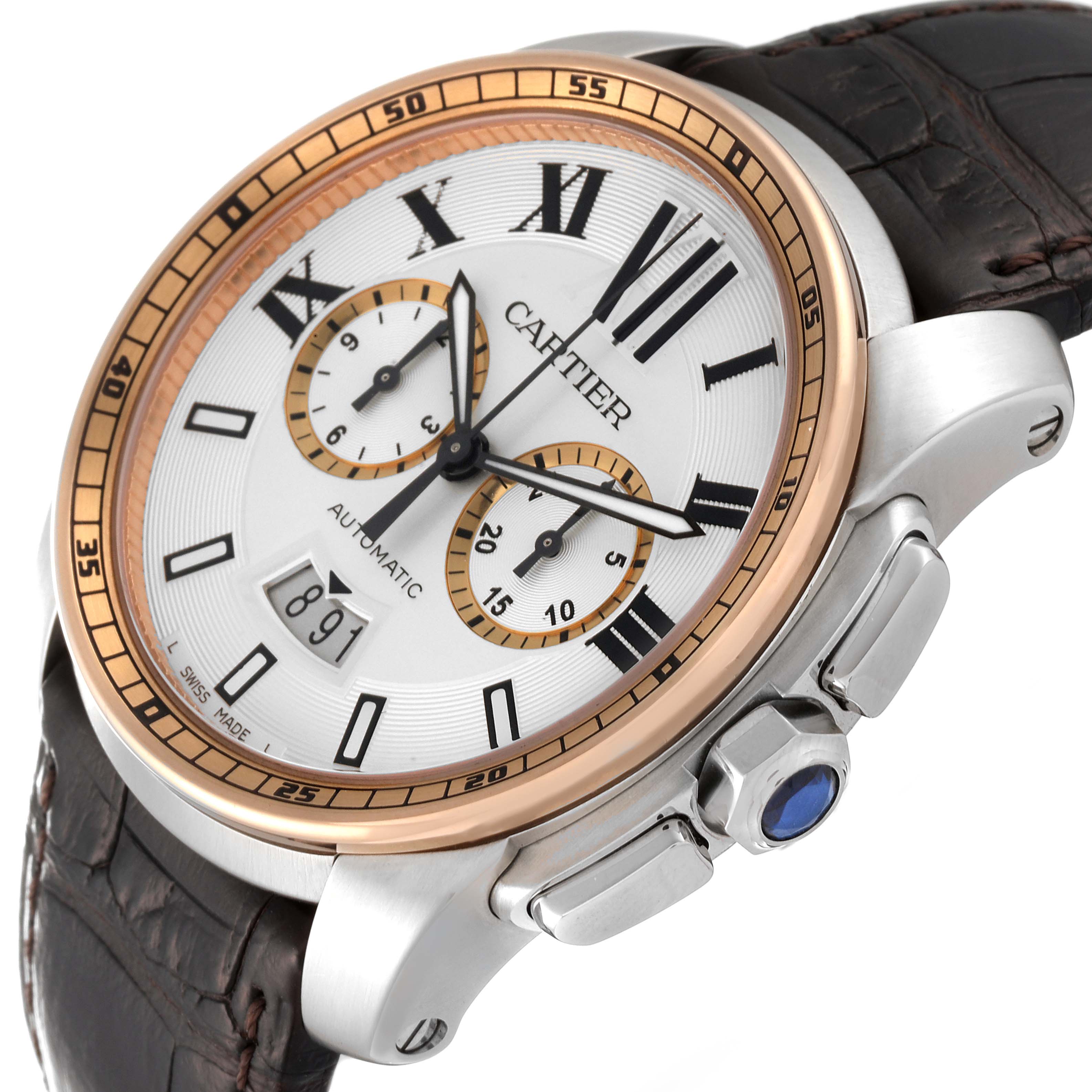 The image shows a Calibre de Cartier watch by Cartier at an angled side view, featuring the dial, bezel, crown, and part of the strap.