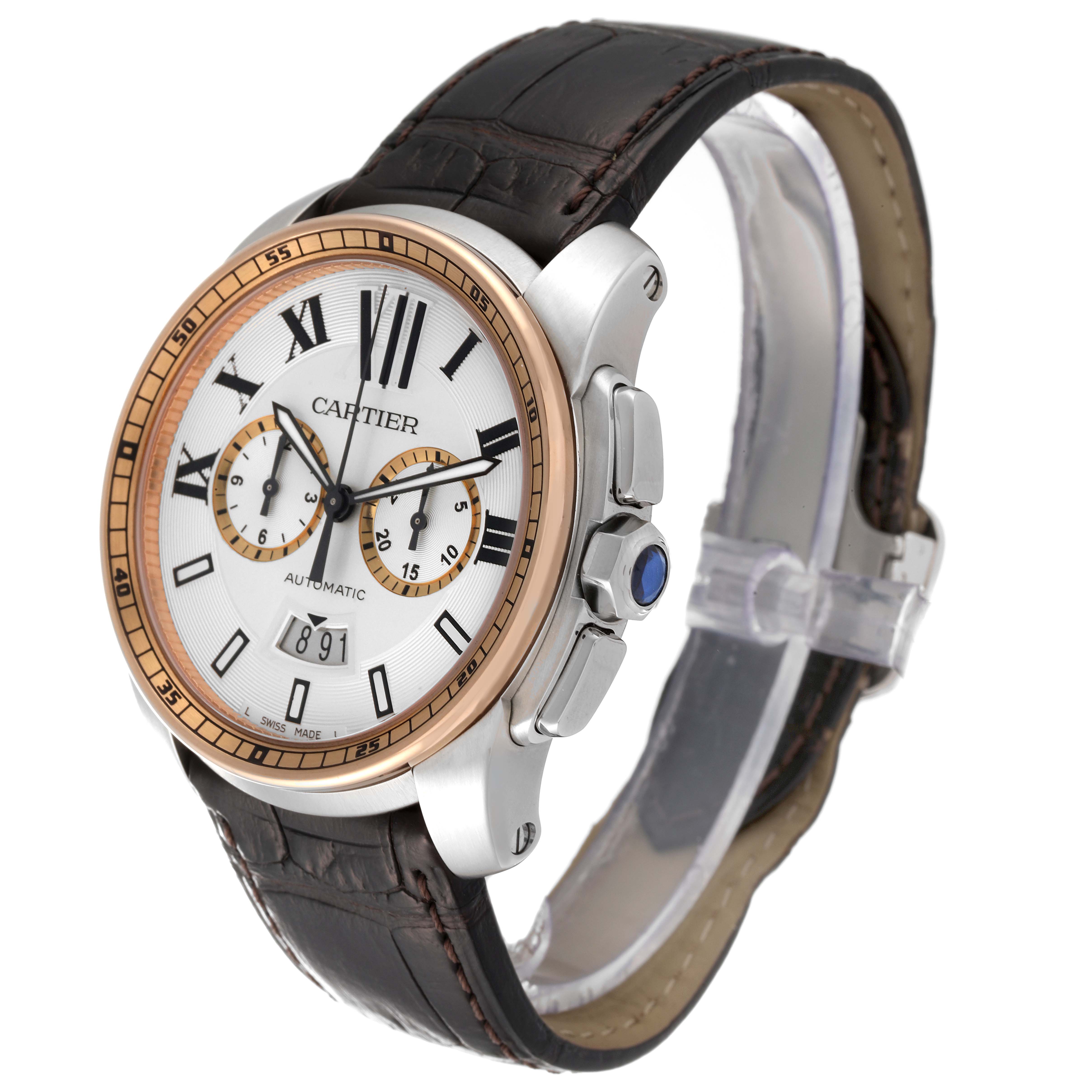 The image shows a Calibre de Cartier watch by Cartier at an oblique angle, highlighting the face, bezel, crown, and strap.