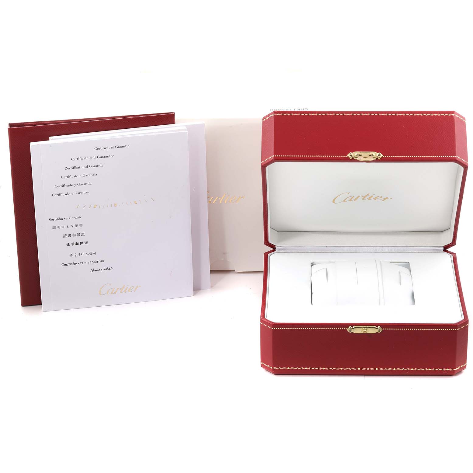 The image shows the packaging, warranty booklet, and presentation box for a Drive de Cartier watch by Cartier.