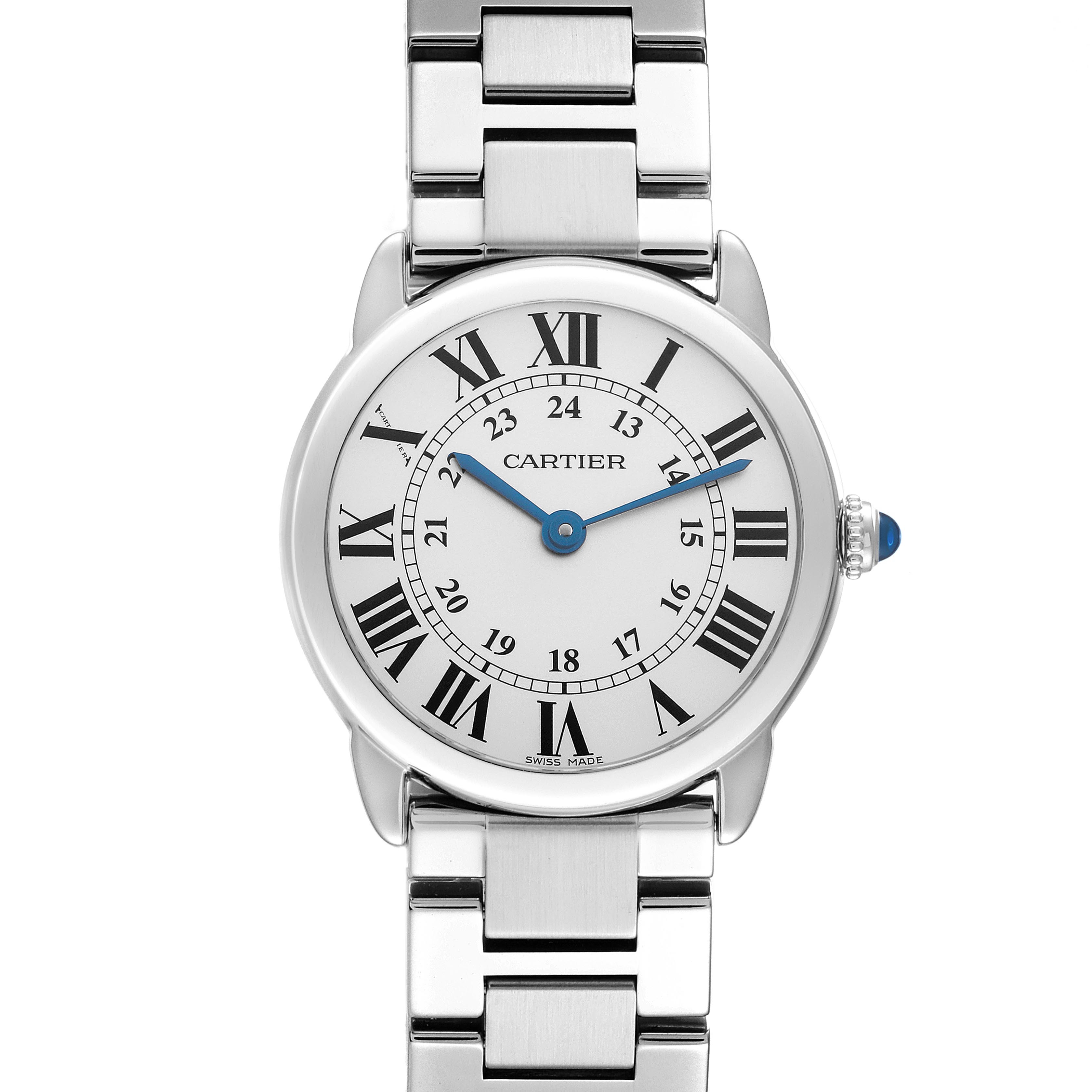 The Cartier Ronde W6701004 Women
s Stainless Steel Silver Dial W6701004 Women
s Stainless Steel Silver Dial watch is shown from a frontal angle, displaying its round dial, Roman numerals, blue hands, and metal bracelet.
