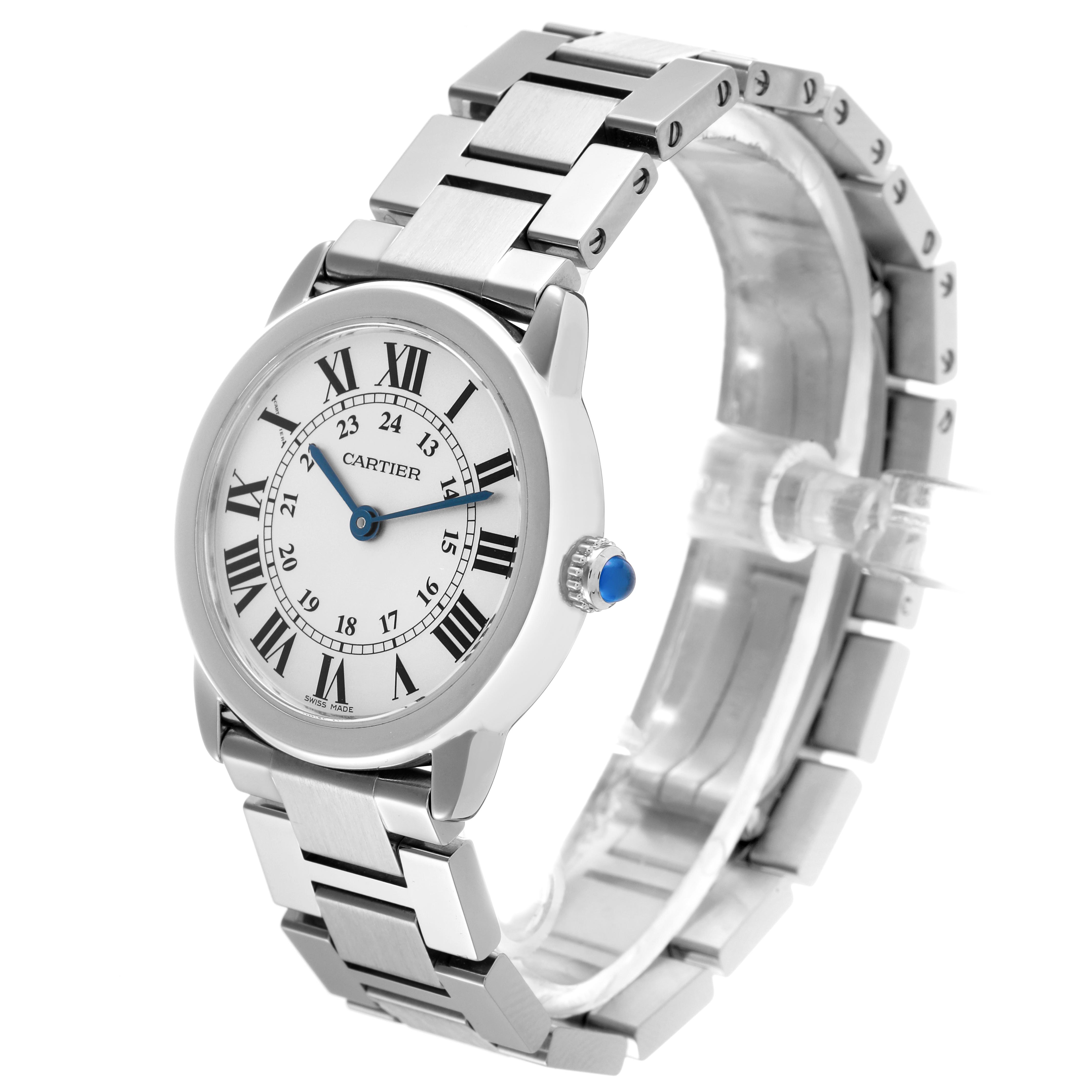 The Cartier Ronde W6701004 Women
s Stainless Steel Silver Dial W6701004 Women
s Stainless Steel Silver Dial watch is shown at an angled view, highlighting its face, bezel, bracelet, and crown with a blue cabochon.