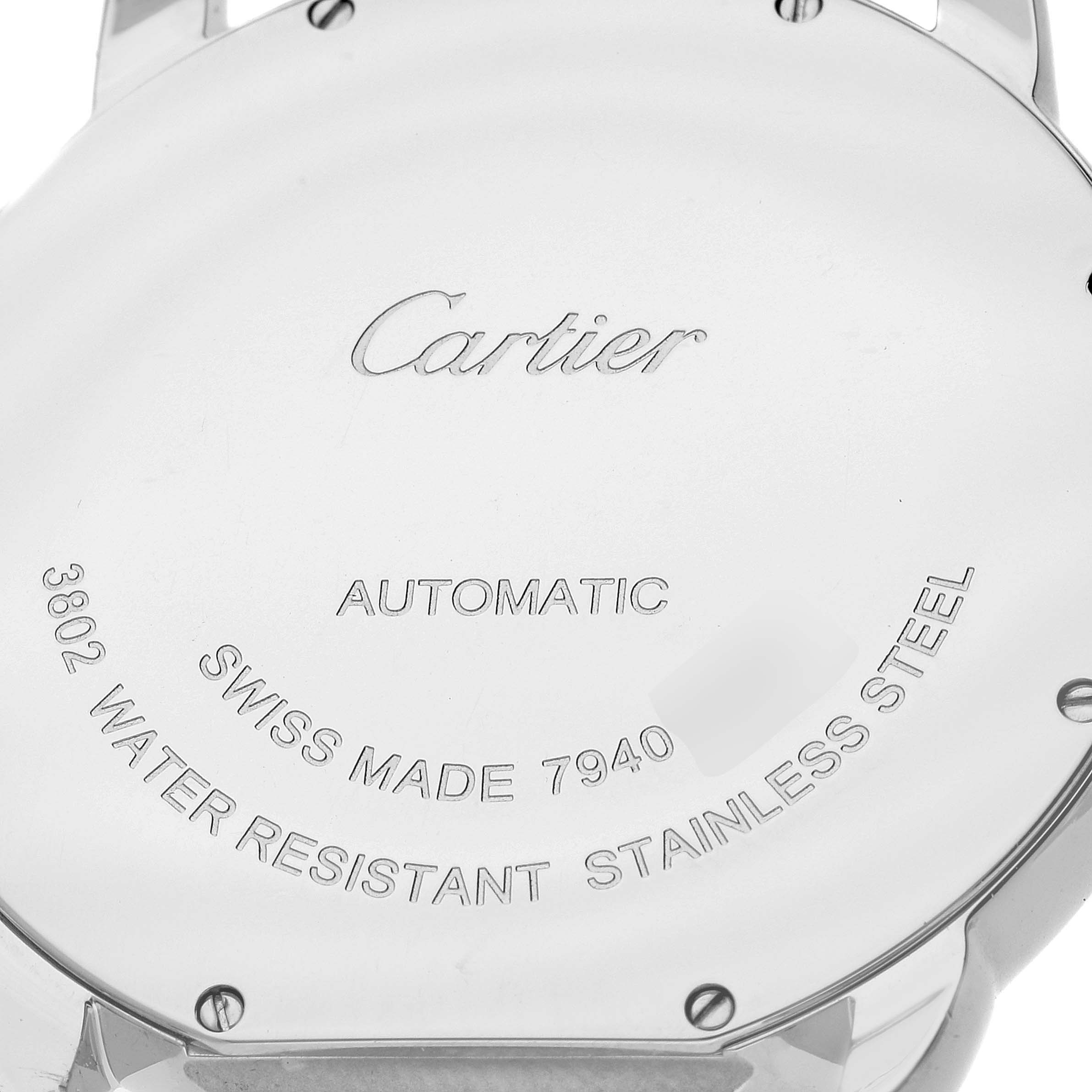 This image shows the case back of a Cartier Ronde W6701011 Men
s Stainless Steel Silver Dial W6701011 Men
s Stainless Steel Silver Dial watch from a close-up angle, displaying the brand
s logo and watch details.