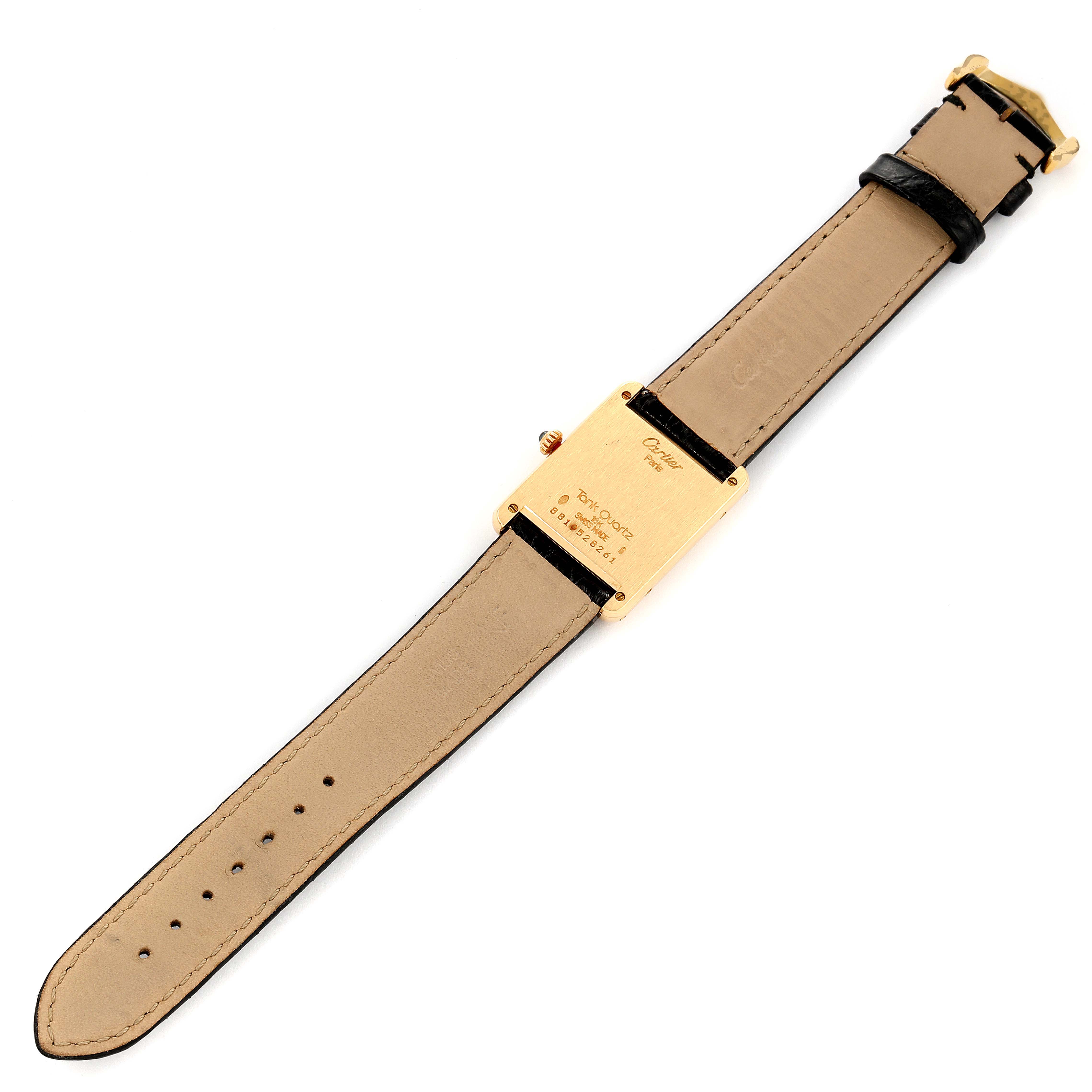 This image shows the back view of a Cartier Tank Classic Women's Yellow Gold White Dial Women's Yellow Gold White Dial watch, displaying the case back and leather strap.