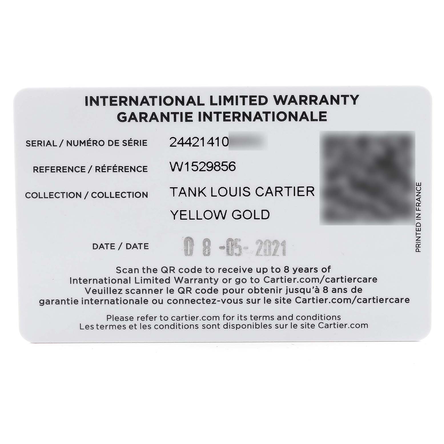 The image shows the international limited warranty card for a Tank Louis Cartier Yellow Gold watch, including serial and reference numbers.