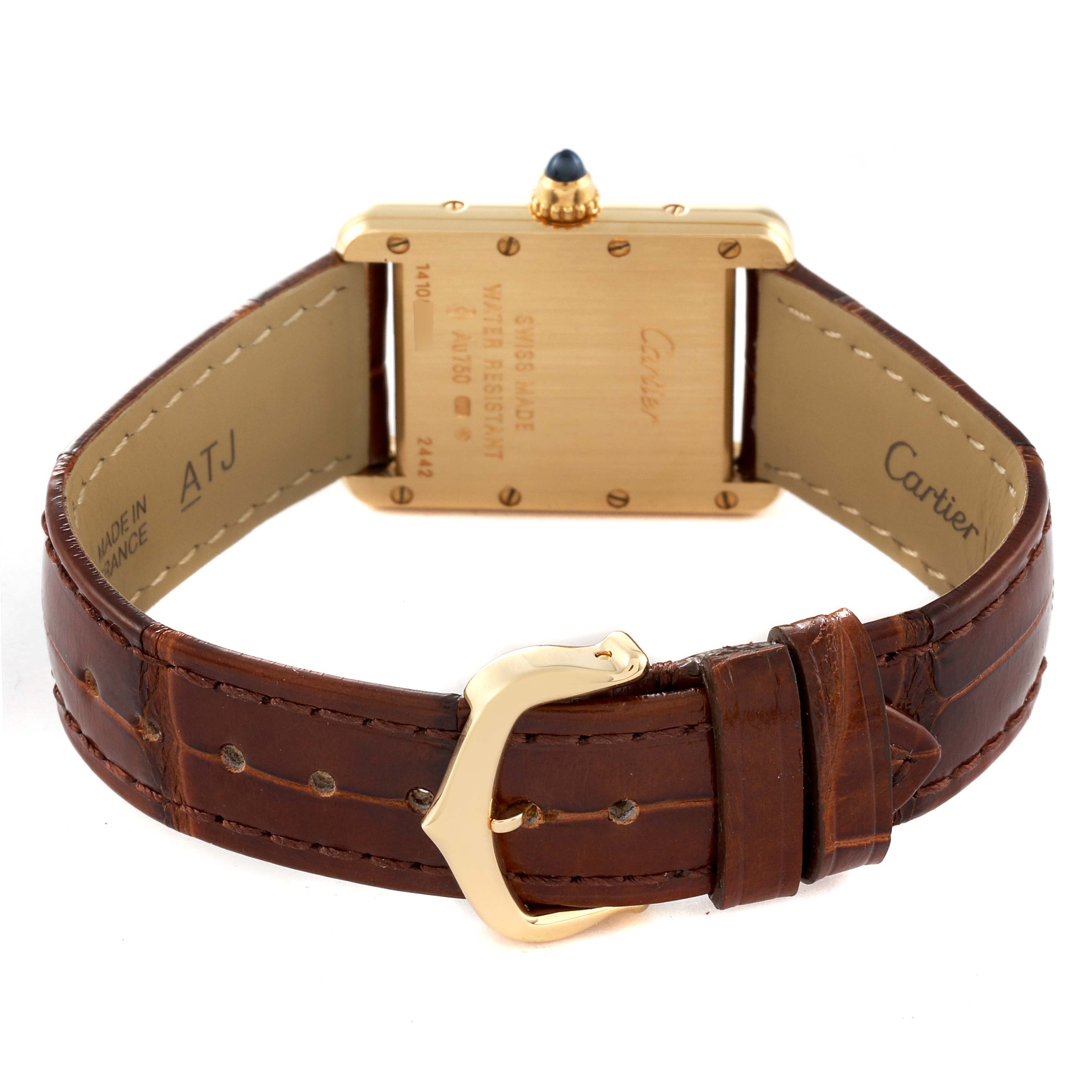 The image shows the back and clasp of the Cartier Tank Louis W1529856 Women's Yellow Gold Silver Dial W1529856 Women's Yellow Gold Silver Dial watch with a brown leather strap.