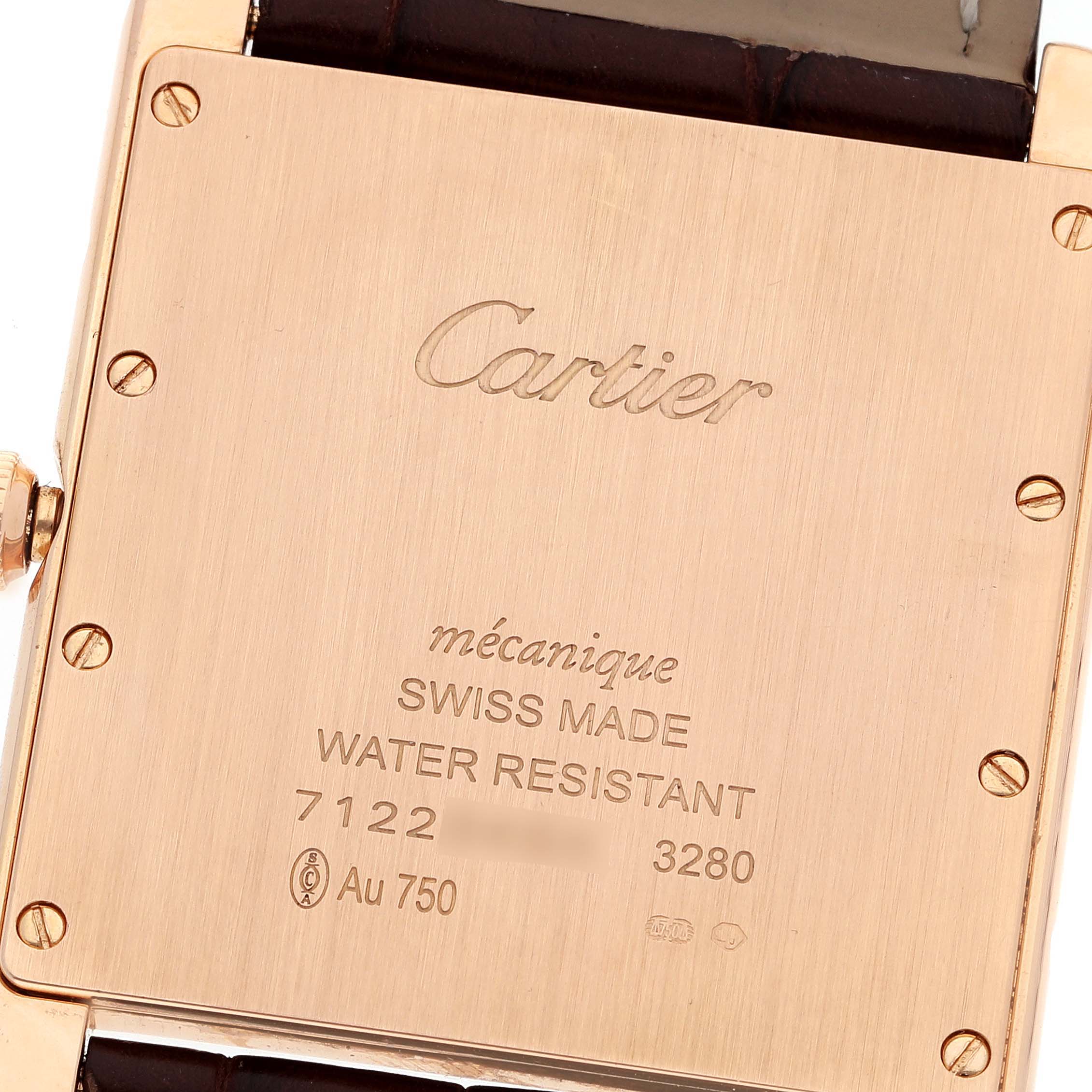 The image shows the back case of a Cartier Tank Louis W1560017 Men's Rose Gold Silver Dial W1560017 Men's Rose Gold Silver Dial watch at a slight angle, displaying brand, model, and specifications.