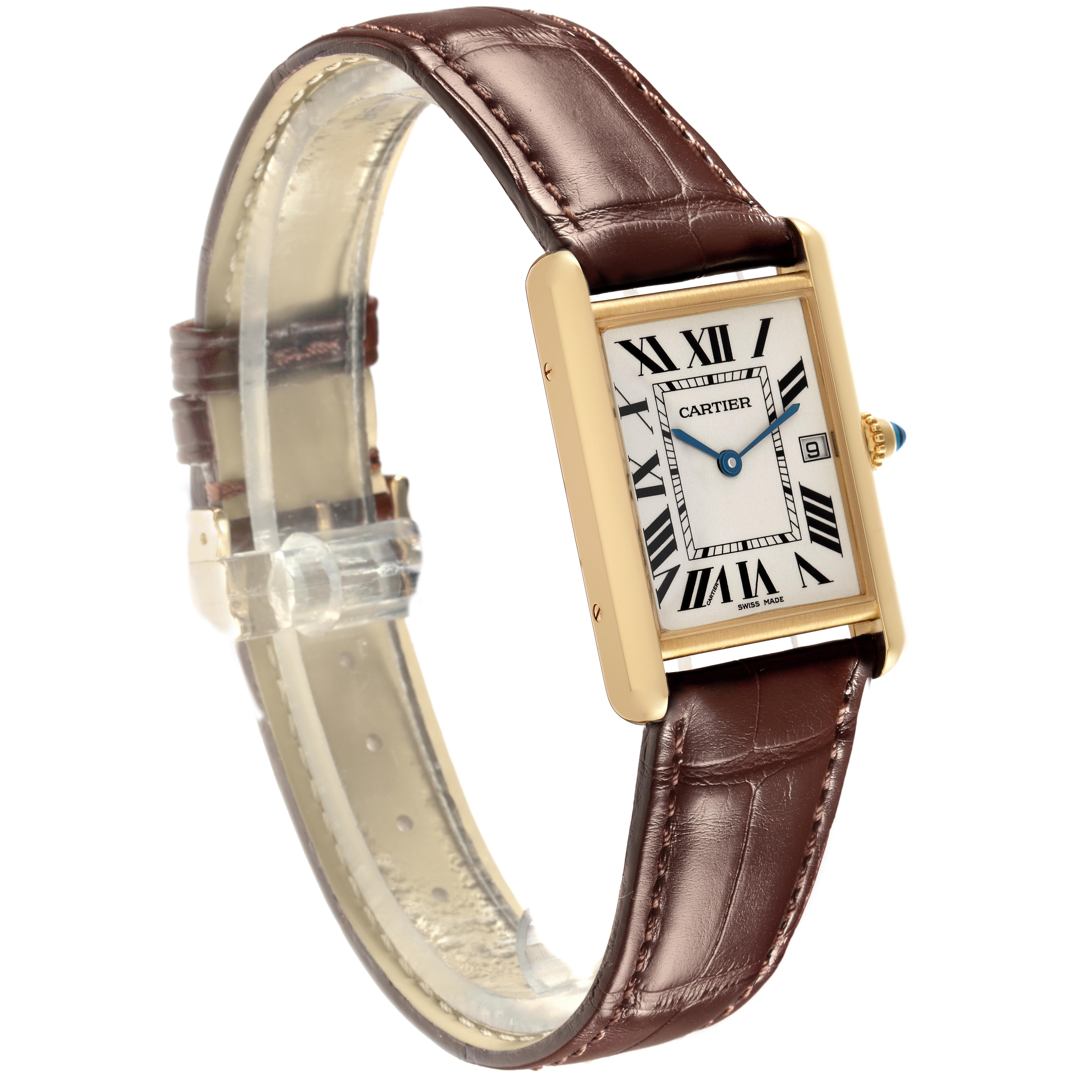 The Cartier Tank Louis W1529756 Men
s Yellow Gold Silver Dial W1529756 Men
s Yellow Gold Silver Dial watch is angled to show the face, case, crown, and a brown leather strap.