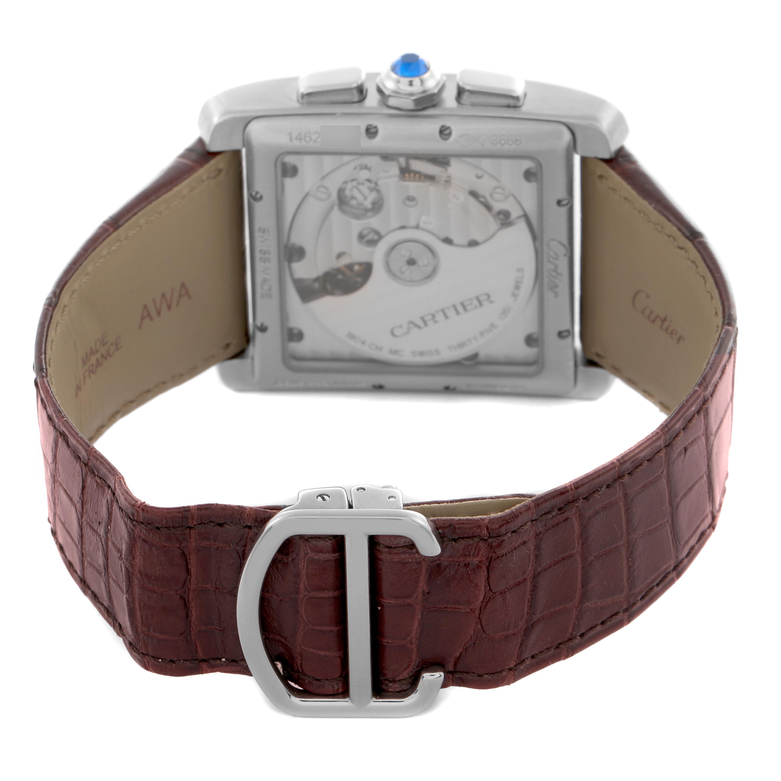 The Cartier Tank MC W5330007 Men
s Stainless Steel Silver Dial W5330007 Men
s Stainless Steel Silver Dial watch is shown from the back, highlighting the transparent case back and brown leather strap.