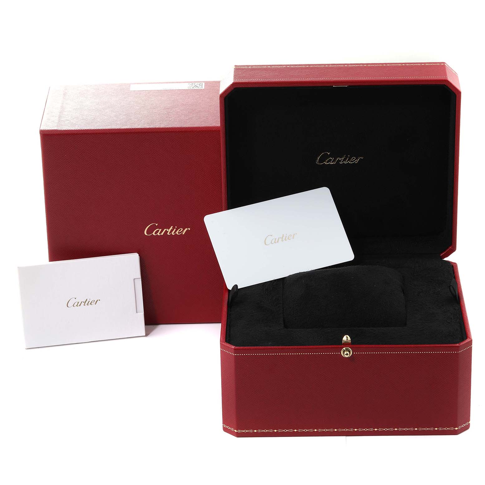 The image shows the red packaging, open box, pillow, booklet, and authenticity card for the Cartier Tank Must WSTA0052 Women's Stainless Steel Silver Dial WSTA0052 Women's Stainless Steel Silver Dial model.
