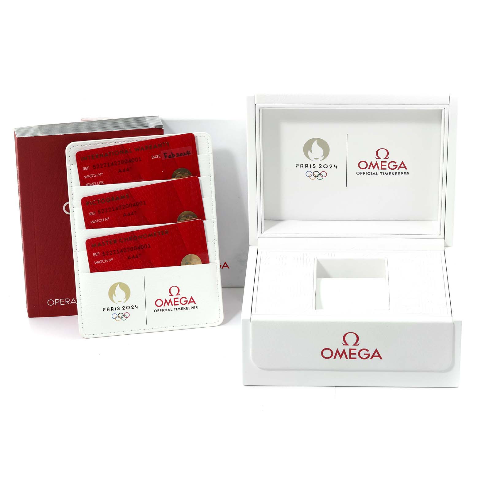 This image shows the packaging and accessories for the Omega Seamaster 522.21.42.20.04.001 Men's Steel and Gold (two tone) White Dial 522.21.42.20.04.001 Men's Steel and Gold (two tone) White Dial, including the warranty cards, booklet, and watch box.