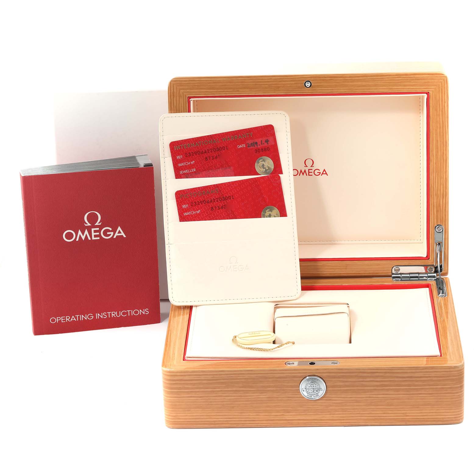 The image shows the wooden box, warranty cards, warranty card holder, and operating instructions for the Omega Planet Ocean 232.90.44.22.03.001 Men's Titanium Blue Dial 232.90.44.22.03.001 Men's Titanium Blue Dial watch.