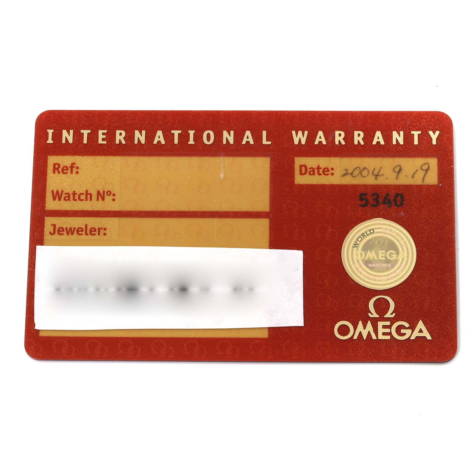 This image shows an Omega Speedmaster 3510.21.00 Men
s Stainless Steel White Dial 3510.21.00 Men
s Stainless Steel White Dial International Warranty card, featuring the date, watch number, and a concealed jeweler
s name.