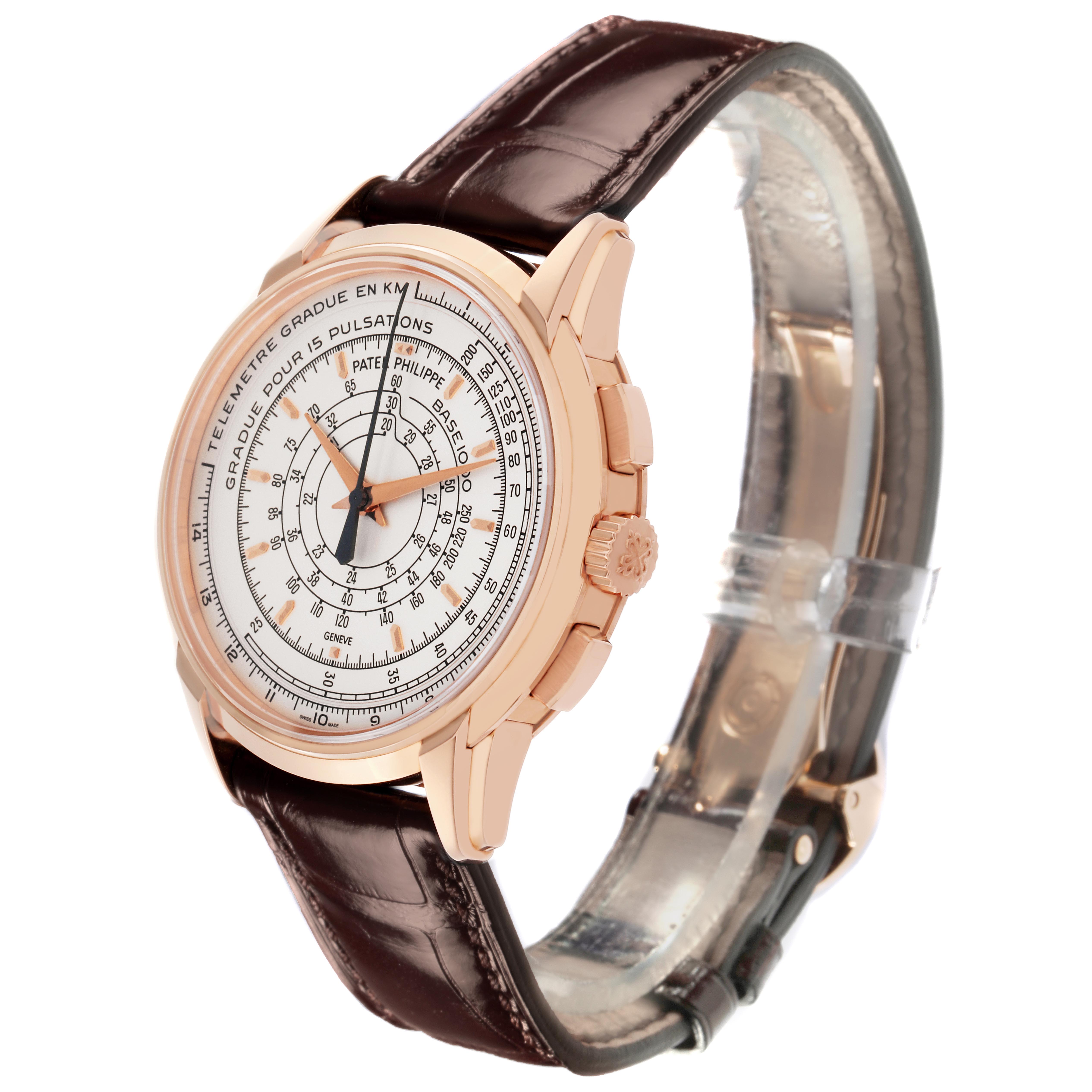 The Patek Philippe Complications 5975R-001 Men
s Rose Gold Silver Dial 5975R-001 Men
s Rose Gold Silver Dial watch is shown at a three-quarter angle, displaying the dial, bezel, crown, and leather strap.