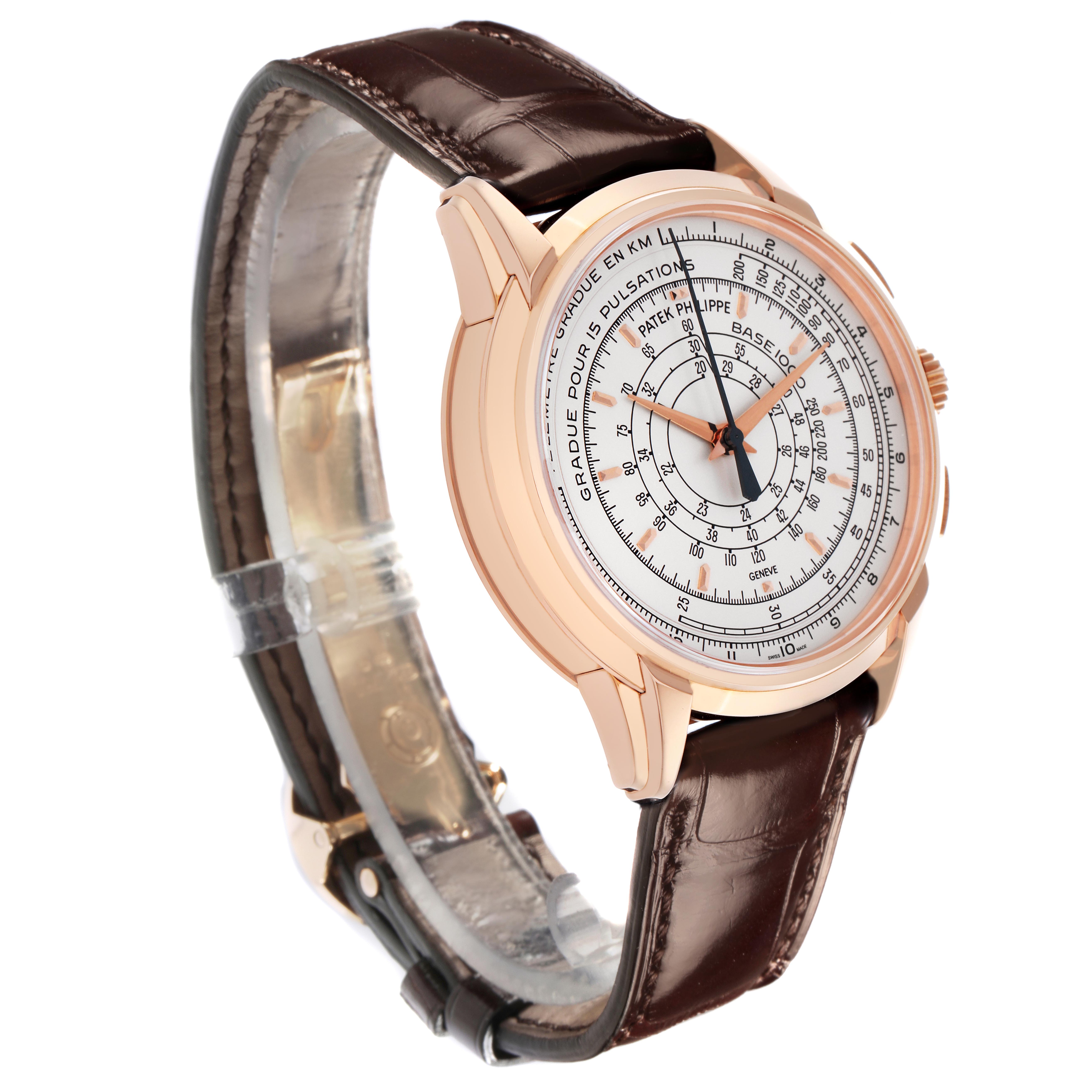 The Patek Philippe Complications 5975R-001 Men
s Rose Gold Silver Dial 5975R-001 Men
s Rose Gold Silver Dial watch is shown from an angled side view, displaying the face, case, and brown leather strap.