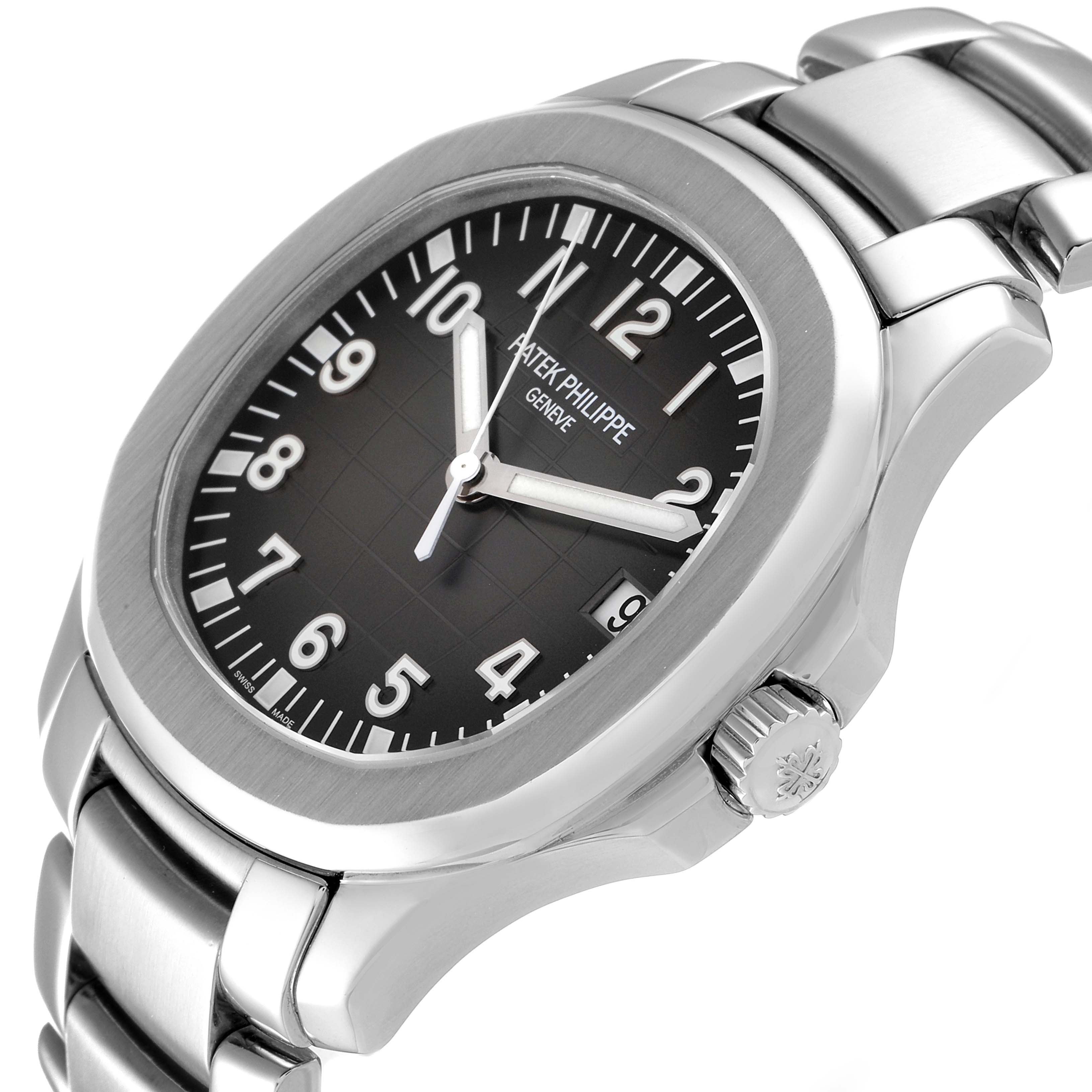 The image shows a side angle view of a Patek Philippe Aquanaut 5167/1A-001 Men's Stainless Steel Black Dial 5167/1A-001 Men's Stainless Steel Black Dial watch, highlighting the crown, dial, and part of the bracelet.