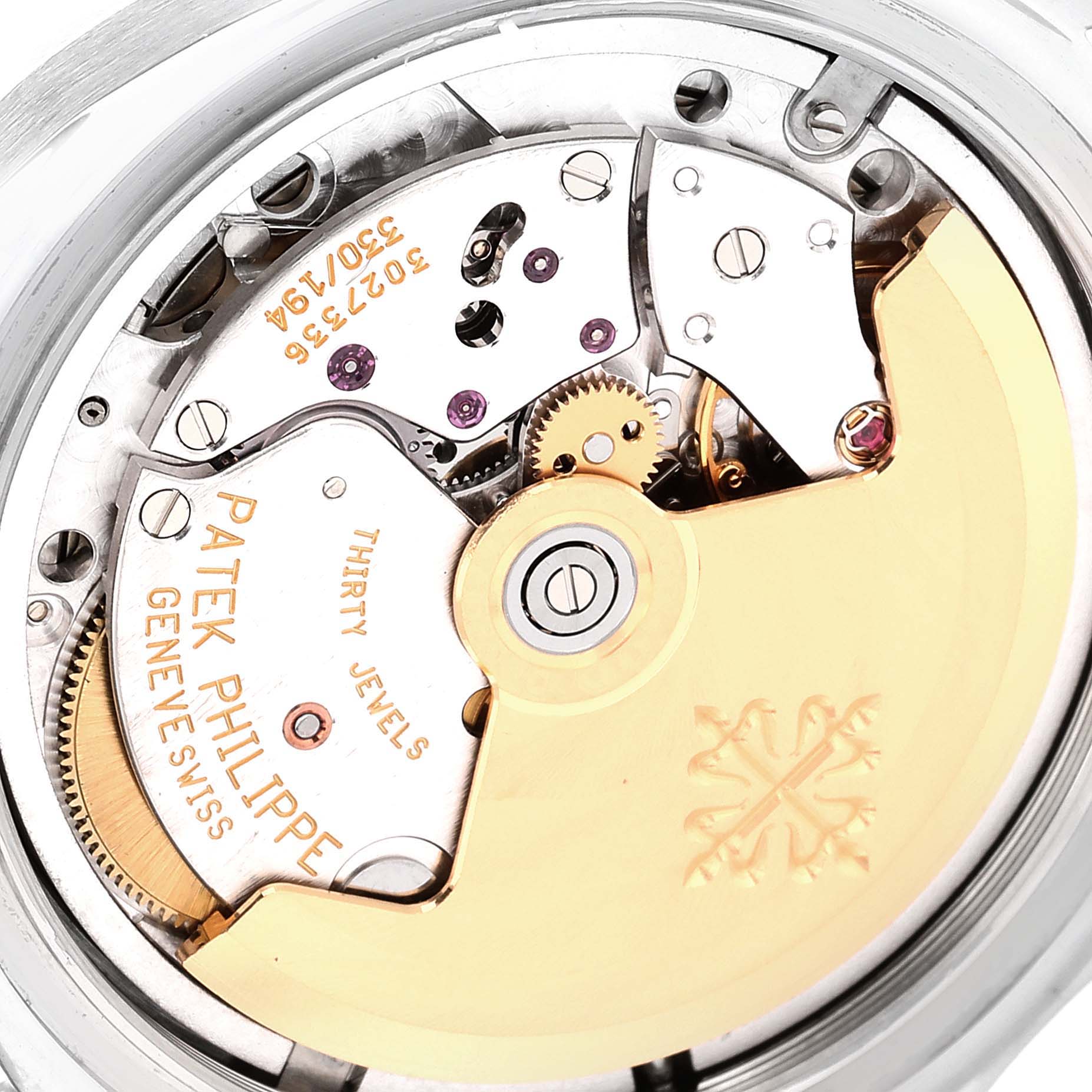 This image shows a close-up of the Patek Philippe Aquanaut 5066A-001 Men
s Stainless Steel Black Dial 5066A-001 Men
s Stainless Steel Black Dial
s internal movement and mechanical parts.